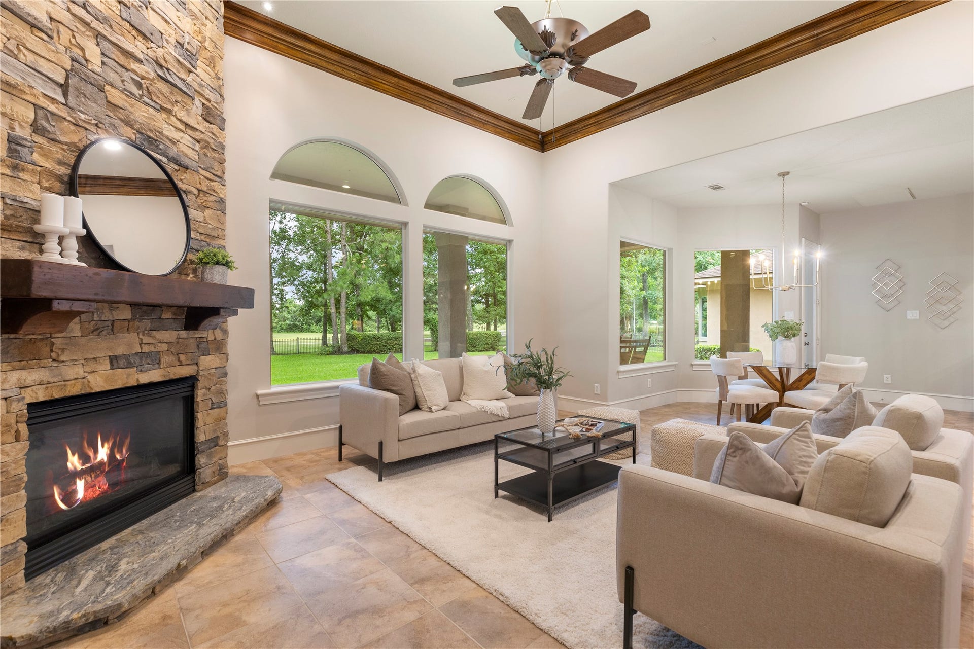 6207 Windrose Hollow Lane, Spring, TX 77379 A closer view of the fireplace wall highlights the custom stonework and mantle detail from the den remodel. This space feels grounded, substantial, and thoughtfully finished.