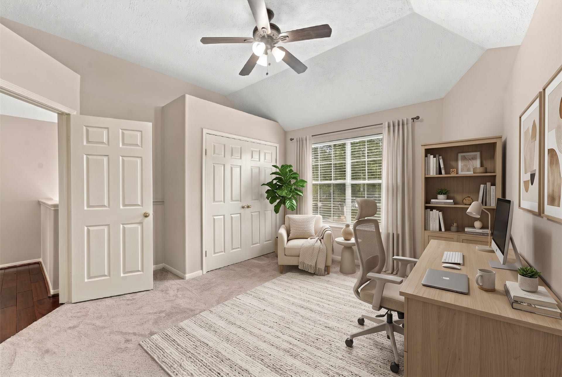 Versatile secondary bedroom bathed in natural light, perfect as an inspiring office or cozy study space.
