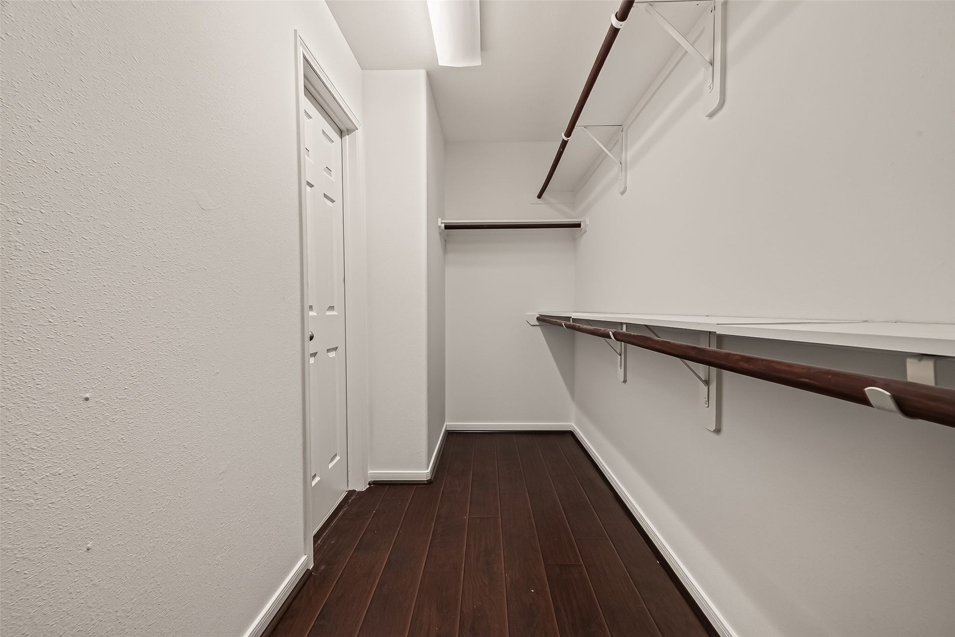 3635 Cottage Manor Lane, Katy, TX 77494 Walk-in closet with double hanging rods and shelving.