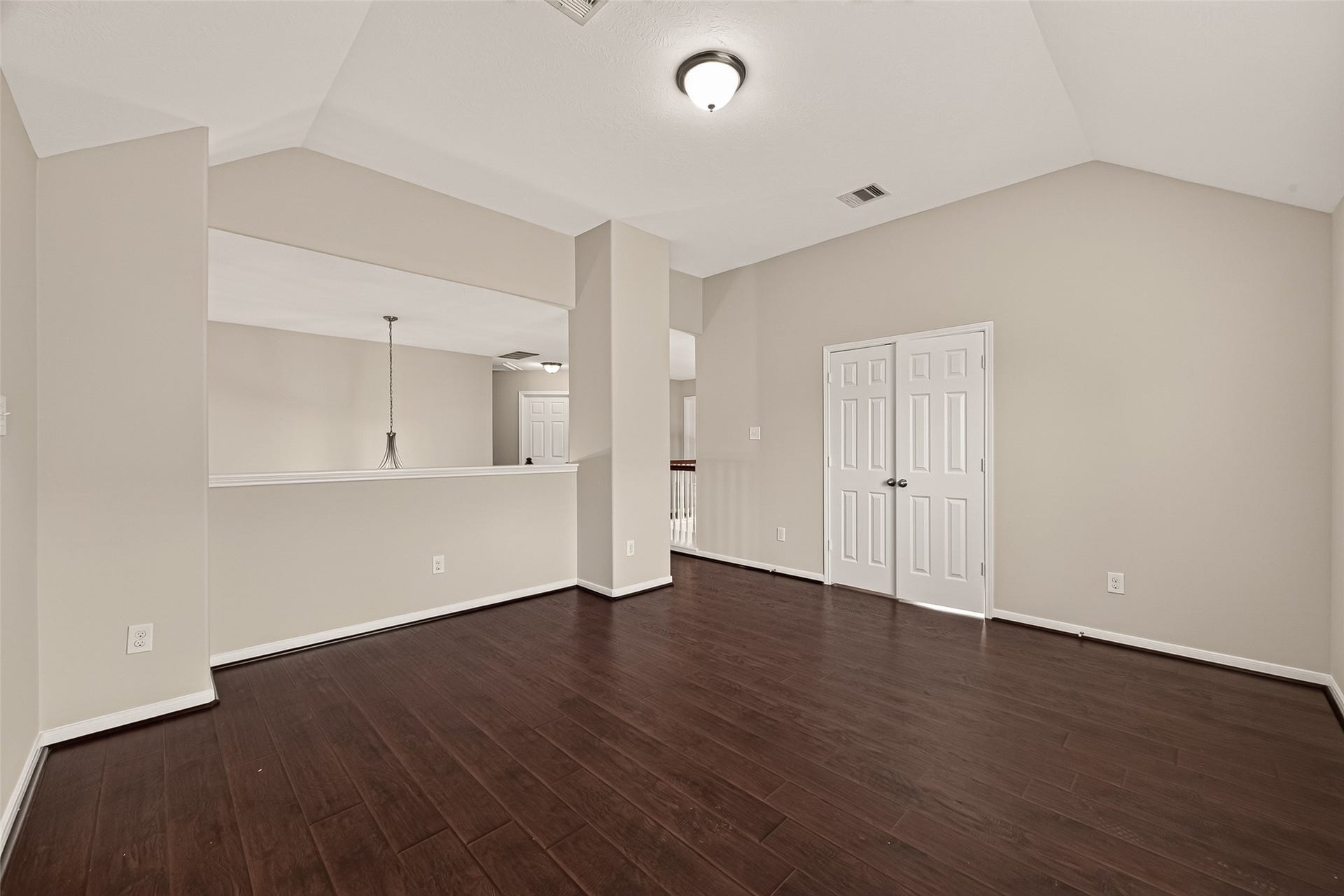 3635 Cottage Manor Lane, Katy, TX 77494 Another view of the game room, showing the double-door storage closet and the overlook to the entry below.