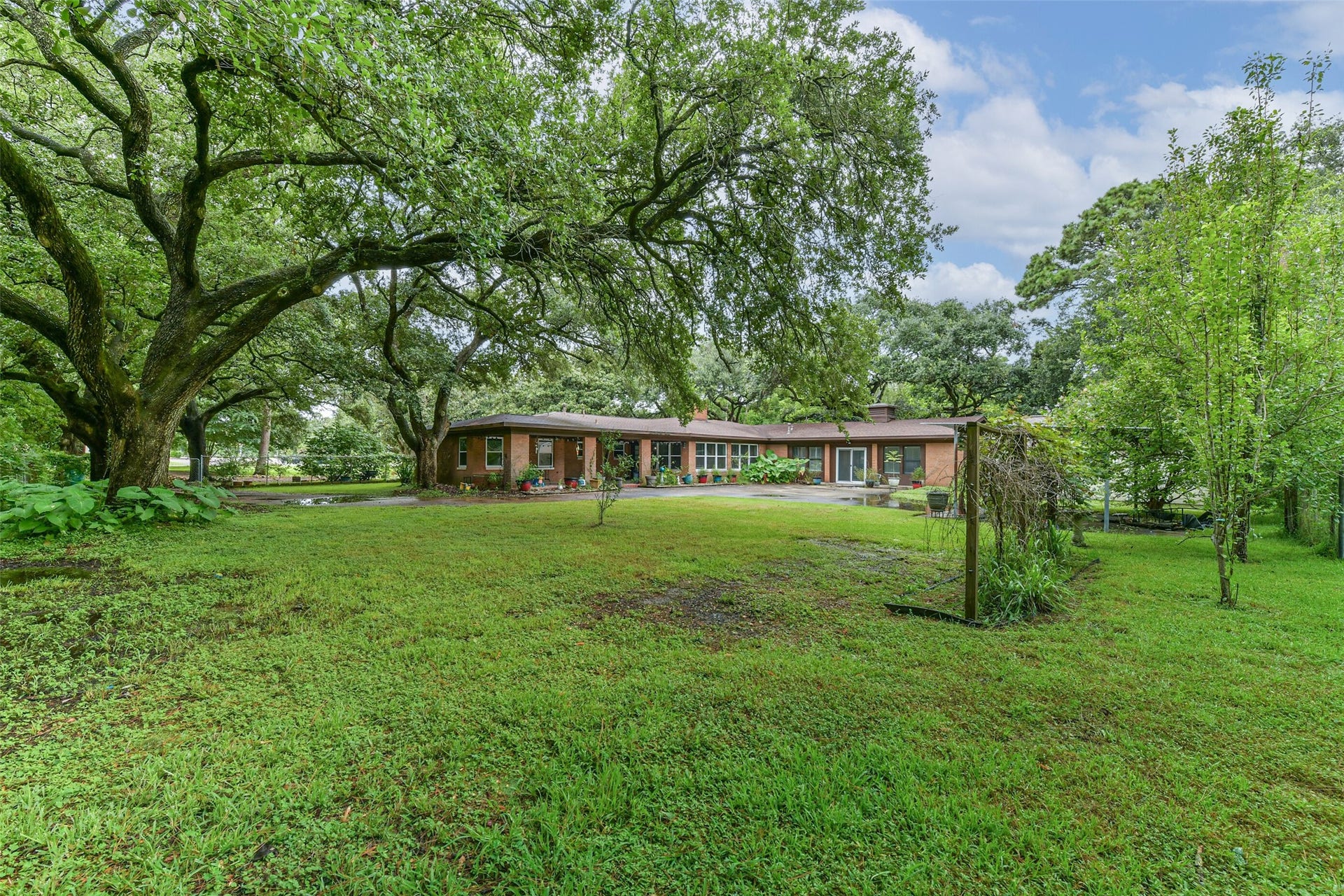 623 Laurel Street, La Marque, TX 77568 View from the back corner of the lot looking towards the back of the house.