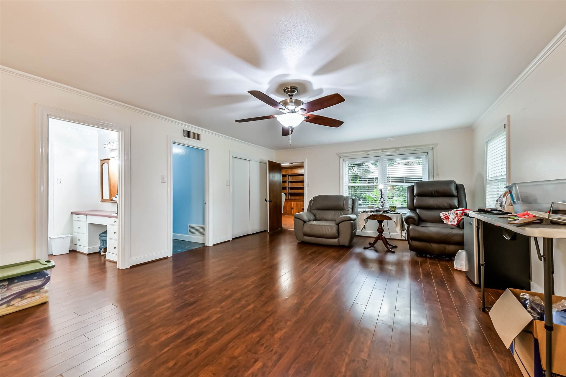 623 Laurel Street, La Marque, TX 77568 Opposite view of the master bedroom, Door at the end leads to private office, notice new windows and double closet next to door to office. The first door on the left leads to the master bathroom.