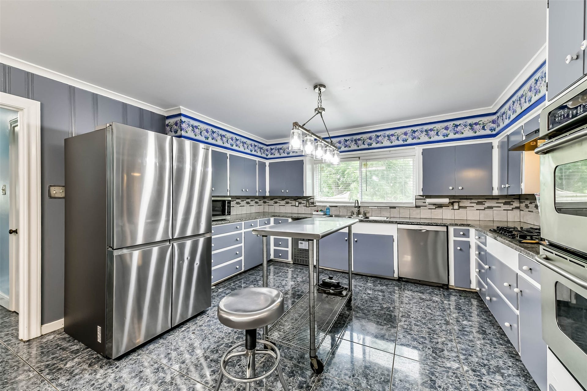 623 Laurel Street, La Marque, TX 77568 Lots of counter space and tons of storage. Large tile flooring, all appliances stay but the metal table on wheels with chair go with the seller
