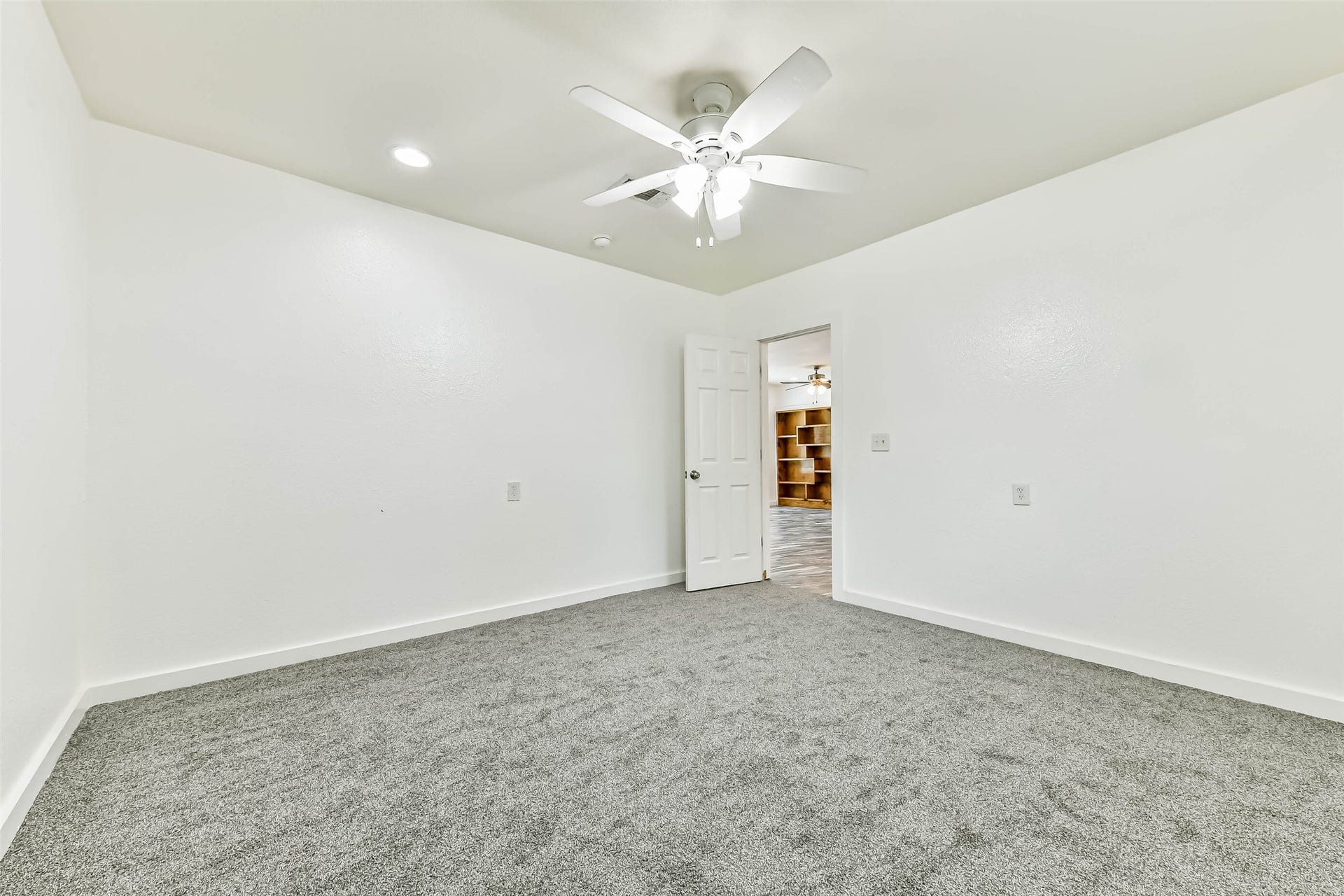 623 Laurel Street, La Marque, TX 77568 View of second bedroom in garage conversion. Just put in brand new carpeting for the new owners