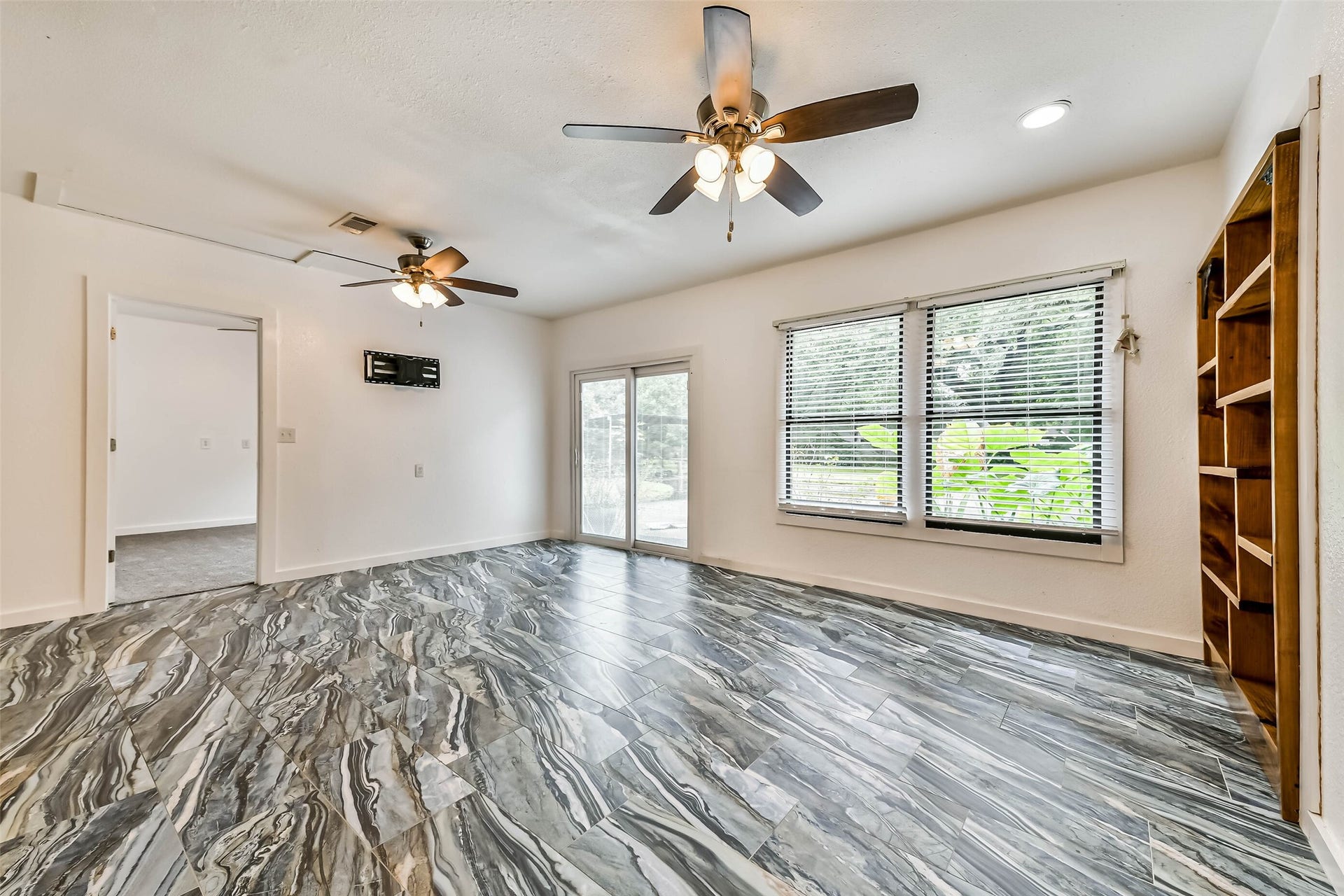 623 Laurel Street, La Marque, TX 77568 View of door to patio, built in shelving, door on left leads to 1st bedroom