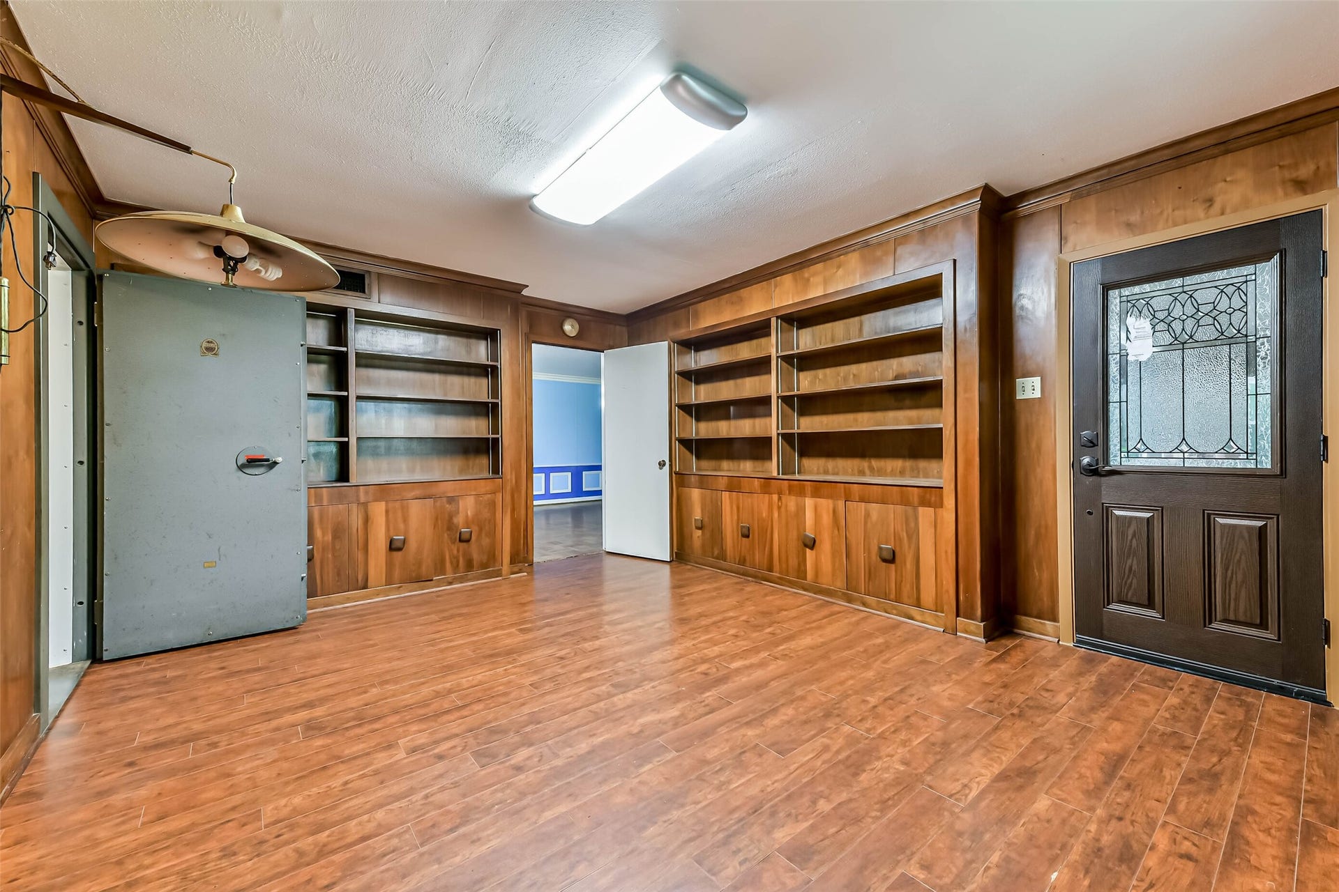 623 Laurel Street, La Marque, TX 77568 Another view of the private office, stain glass door which is new and windstorm certified has a private exterior entrance to the office. Office also has a door to the formal living and dining and the master bedroom