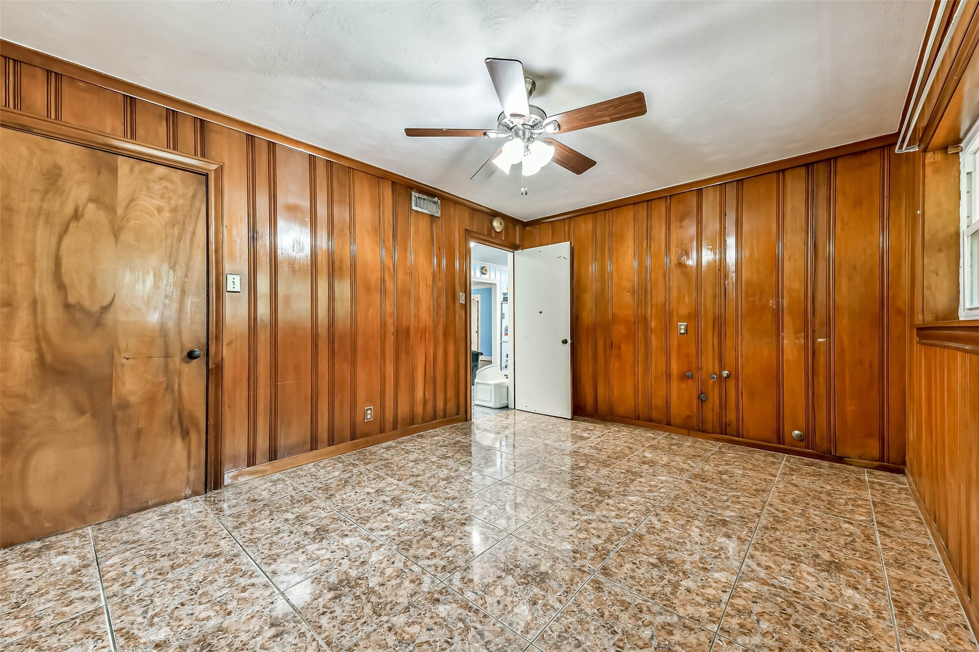 623 Laurel Street, La Marque, TX 77568 Another view of 3rd secondary bedroom, it's located just off the kitchen and between the garage conversion. Beautiful wood paneling