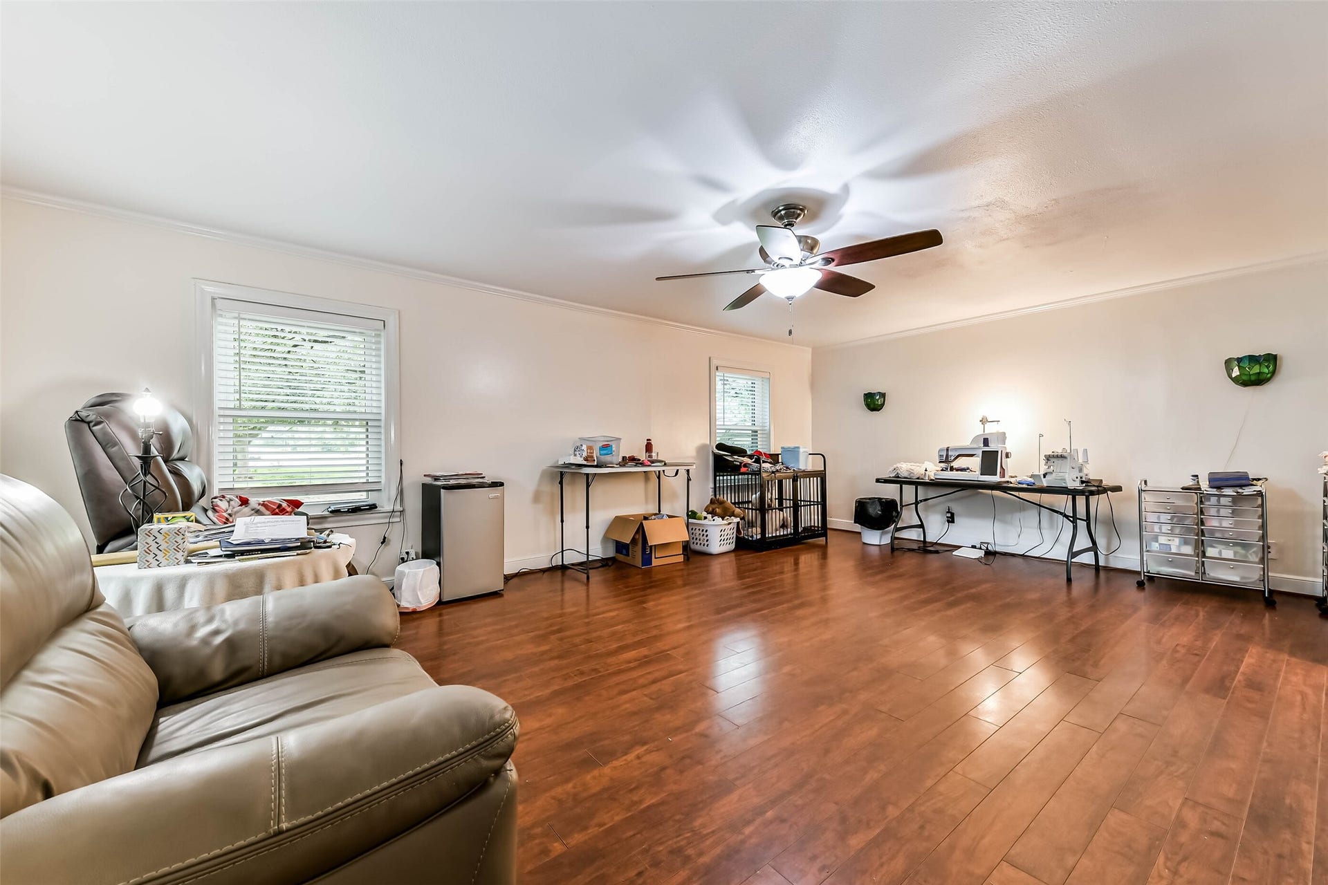 623 Laurel Street, La Marque, TX 77568 Master bedroom with seating area, wood plank flooring, new windows, numerous closets!