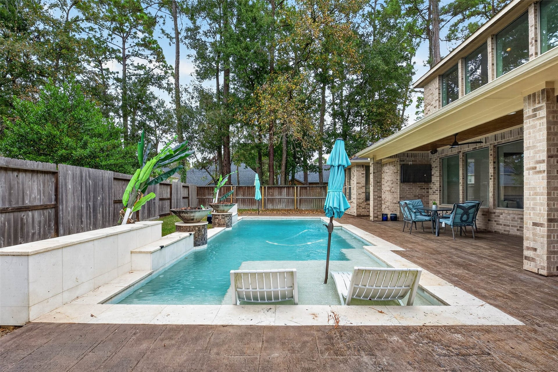 12455 Cedar Breaks Court, Humble, TX 77346 The two pool loungers are included.