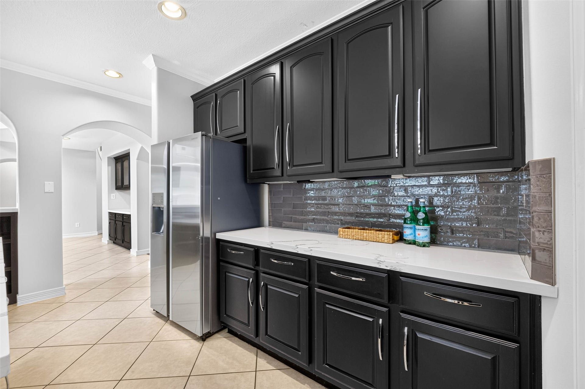12455 Cedar Breaks Court, Humble, TX 77346 The stainless fridge is included.