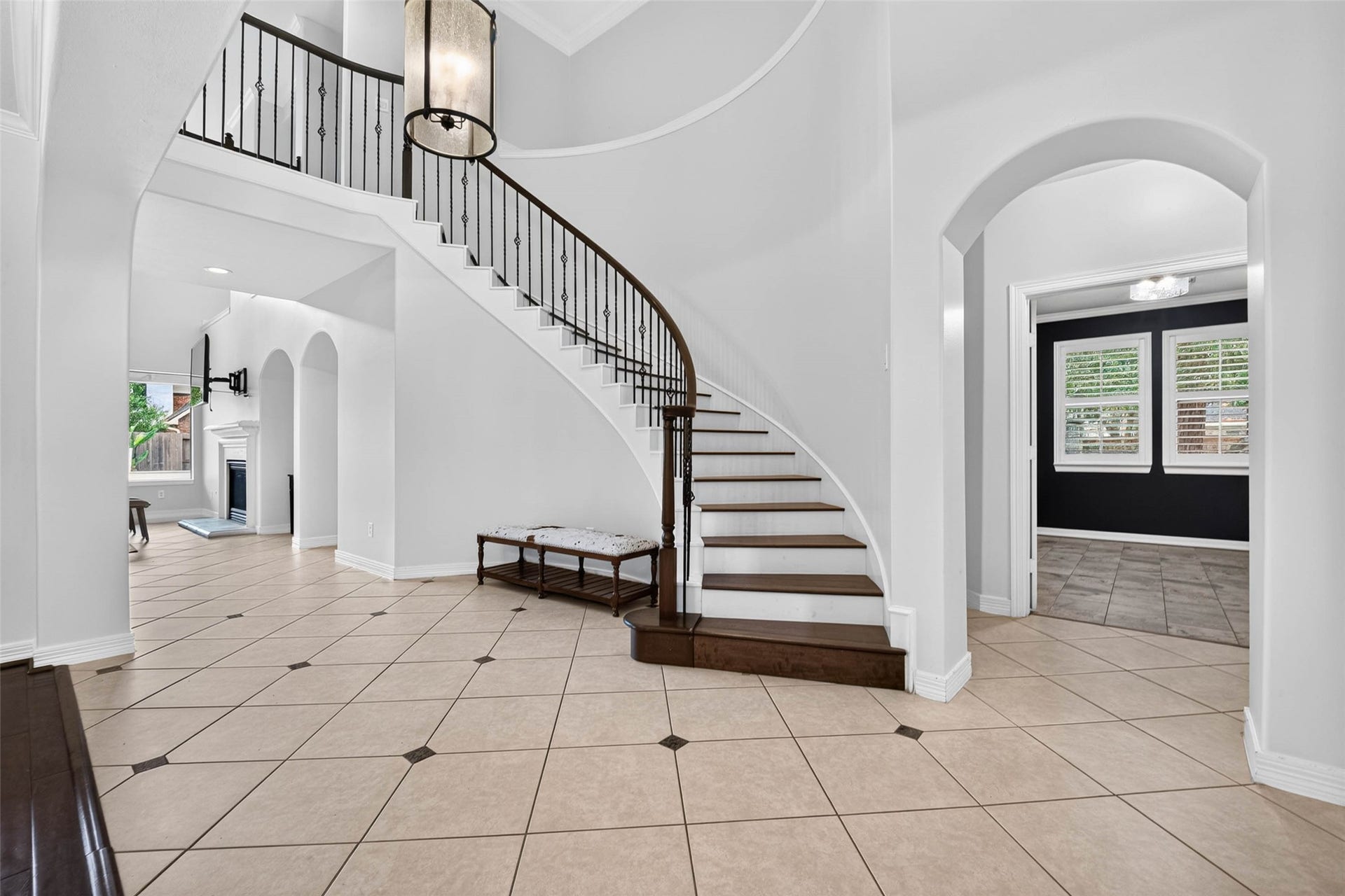 12455 Cedar Breaks Court, Humble, TX 77346 A lovely entrance with spiral staircase.