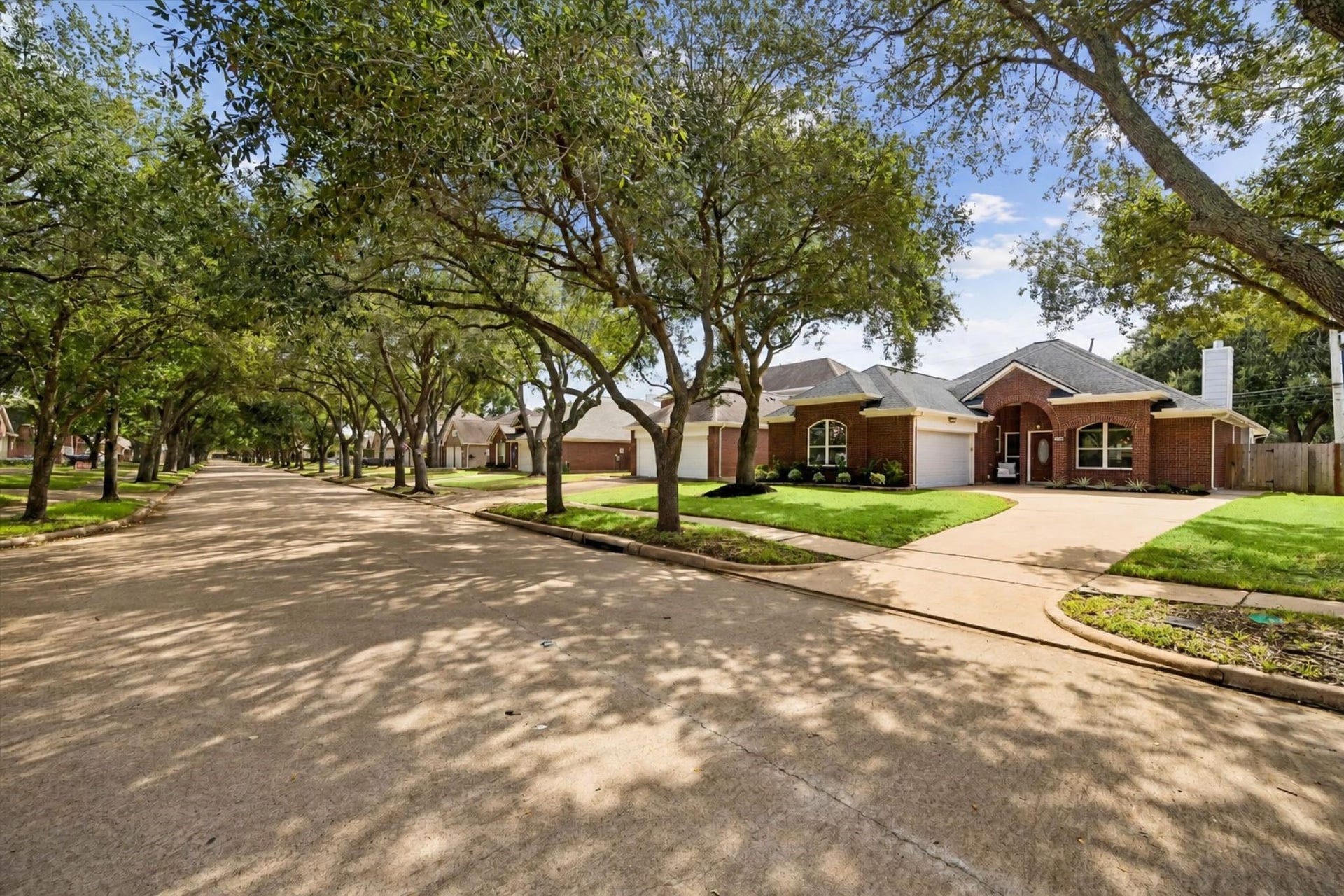 Tree-lined Topaz Trail provides a welcoming setting within the sought-after New Territory community.