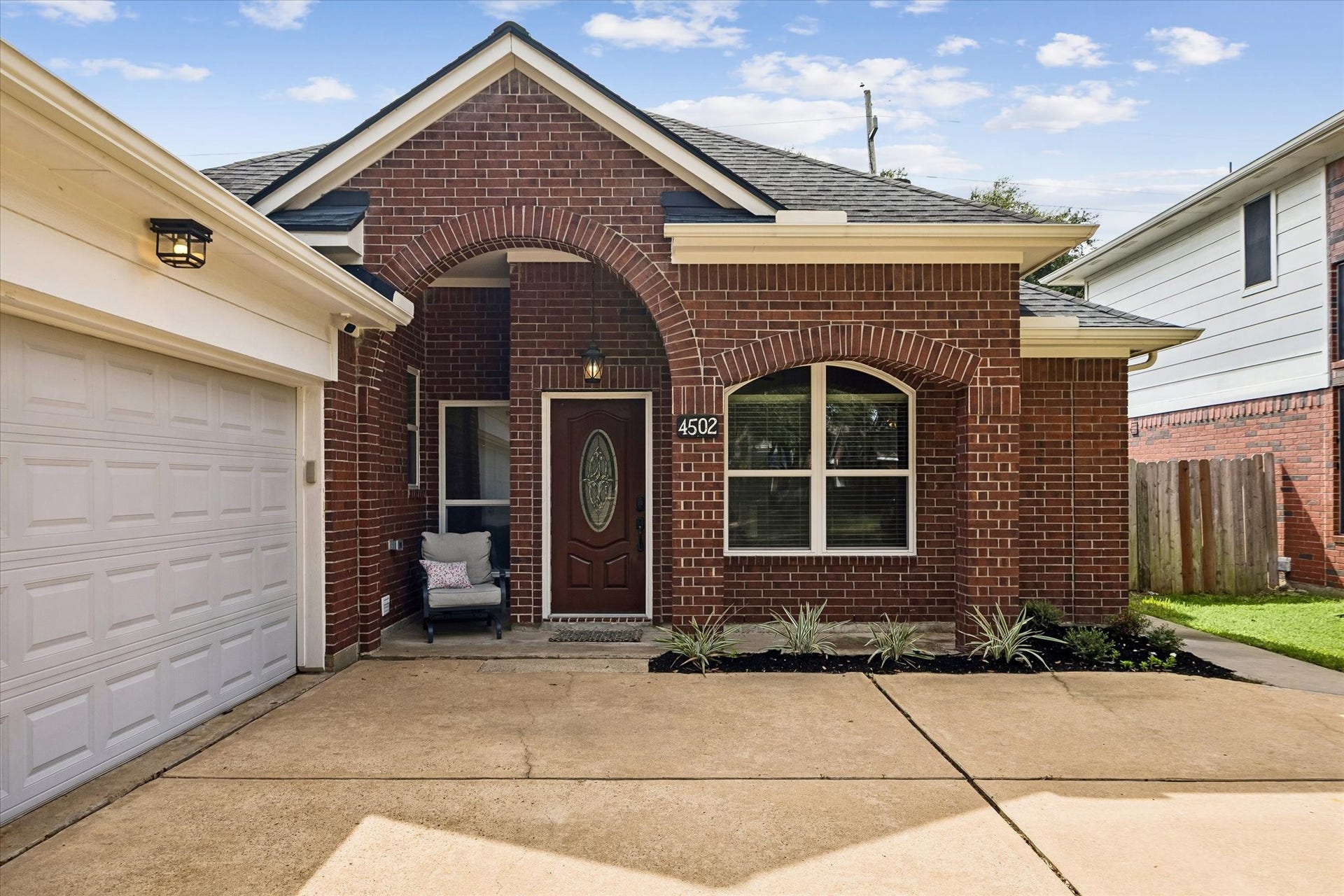 A welcoming front entry begins the tour of this thoughtfully maintained single-story home.