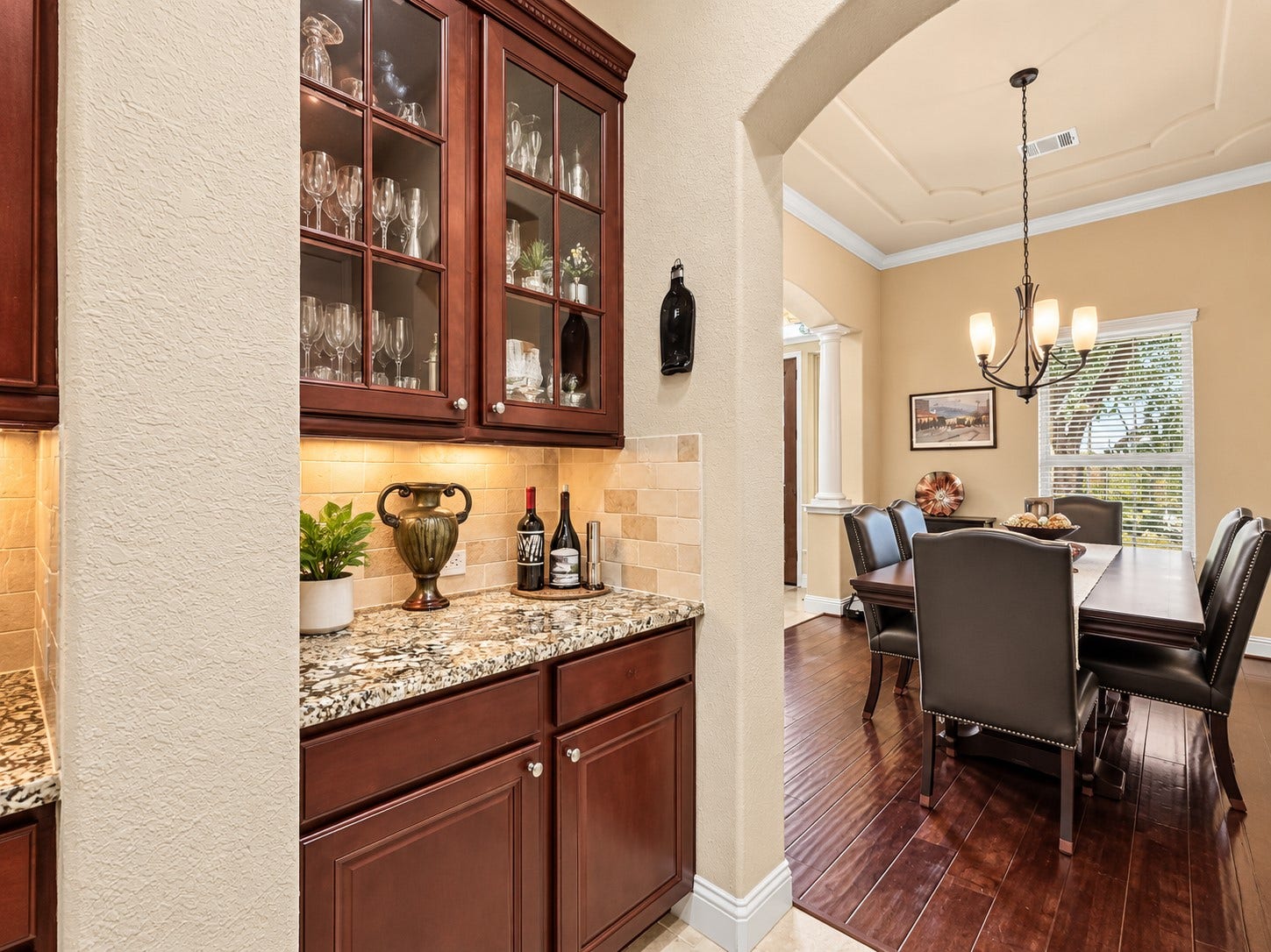 59 Tioga Place, Tomball, TX 77375 The Butler's Pantry offers extra cabinet and counter space for storing your kitchen items. It also offers a second entrance to the beautiful formal dining room.