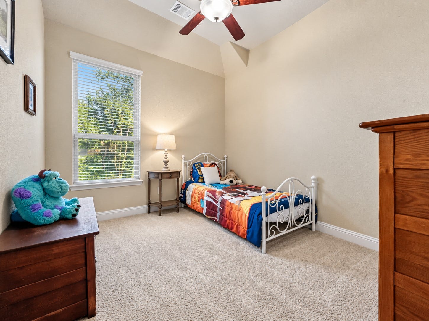 59 Tioga Place, Tomball, TX 77375 This generously sized bedroom offers a comfortable retreat for family or overnight guests.