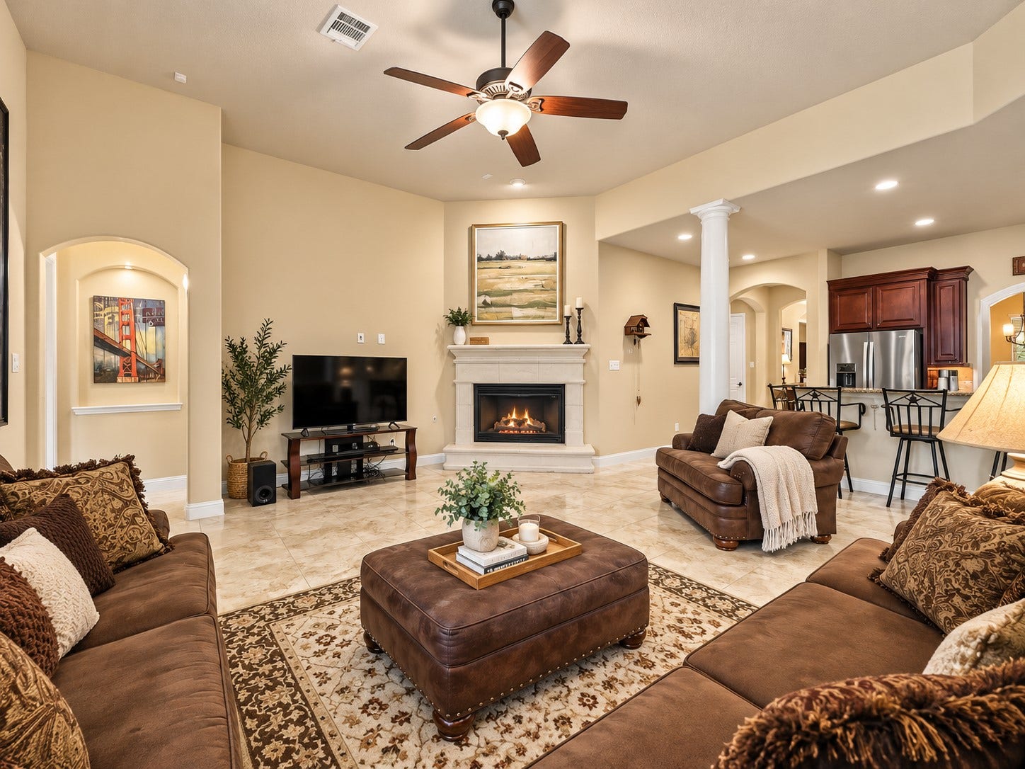 59 Tioga Place, Tomball, TX 77375 Enjoy a living room that brings the outdoors into view while keeping you connected to the kitchen and dining areas. Settle in by the fireplace and enjoy a relaxing evening with family while the backyard views provide a beautiful backdrop.