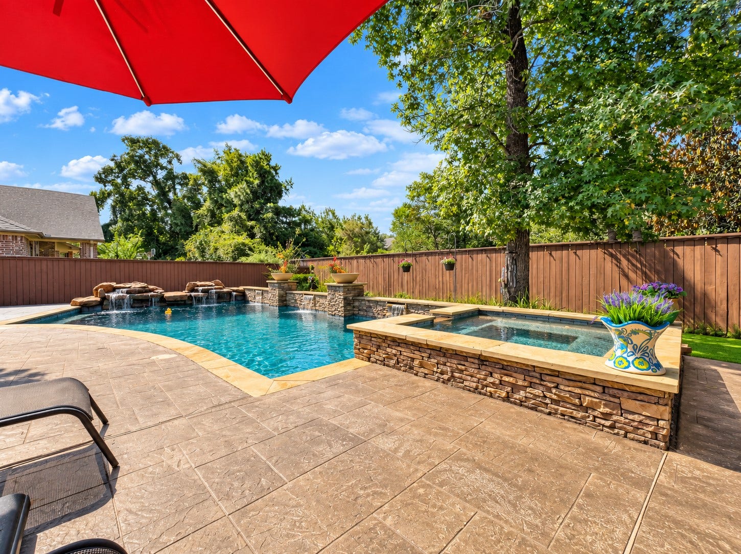 59 Tioga Place, Tomball, TX 77375 With the pool and spa as the focal point, the backyard offers a wonderful setting for weekend gatherings, family time, and quiet afternoons at home.