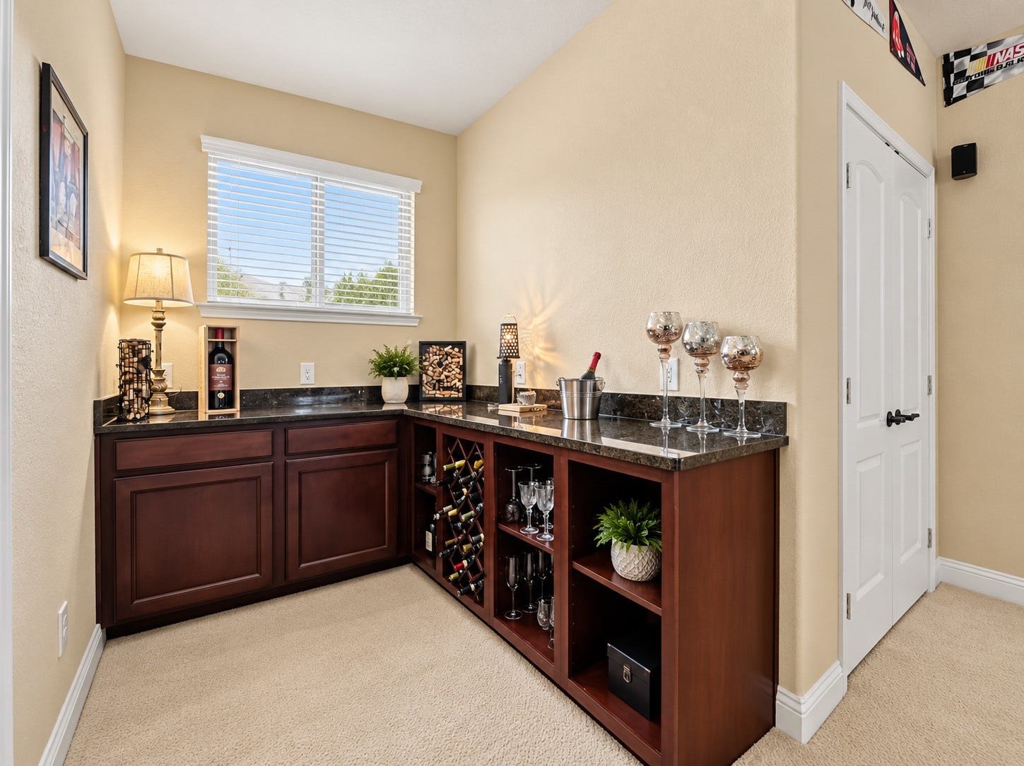 59 Tioga Place, Tomball, TX 77375 The custom built-in bar area in the upstairs game room adds a nice touch to this already perfect game room/movie room space. From game day with friends to a relaxed movie night, the built-in bar makes the upstairs game room even more ready for entertaining.