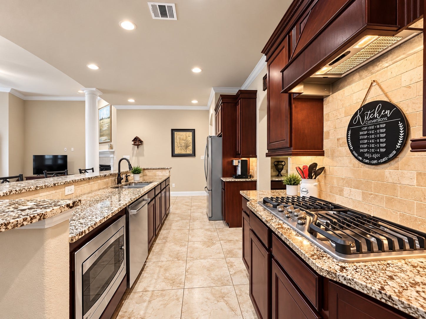 59 Tioga Place, Tomball, TX 77375 With generous cabinet storage and abundant counter space, this kitchen makes meal preparation and entertaining feel effortless.