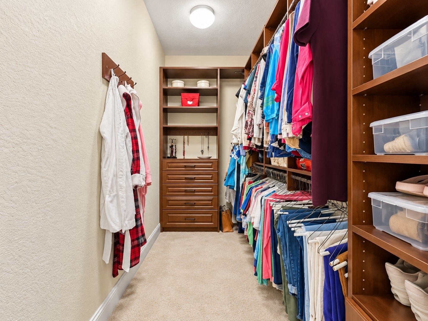 59 Tioga Place, Tomball, TX 77375 Walk-in closets provide dedicated storage for clothing, shoes, and accessories, helping keep the primary suite organized.
