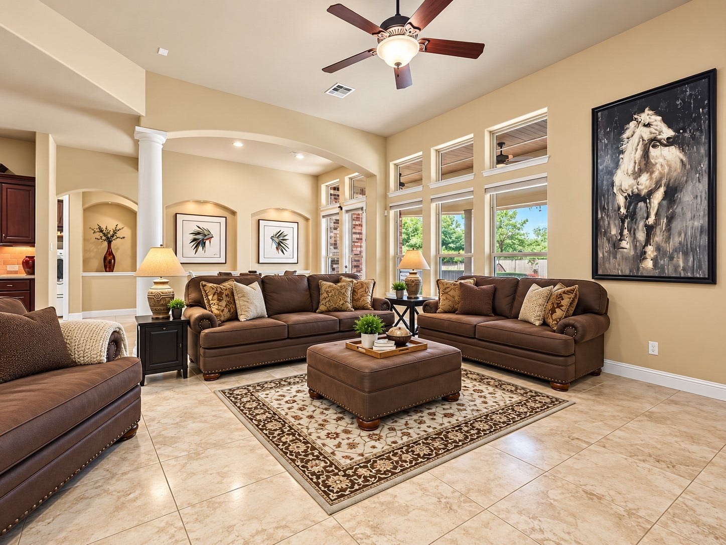 59 Tioga Place, Tomball, TX 77375 Surrounded by windows, the living room fills with natural light and offers beautiful views of the backyard pool and spa. Whether enjoying your morning coffee or relaxing at the end of the day, the backyard views add to the appeal of this inviting living space.
