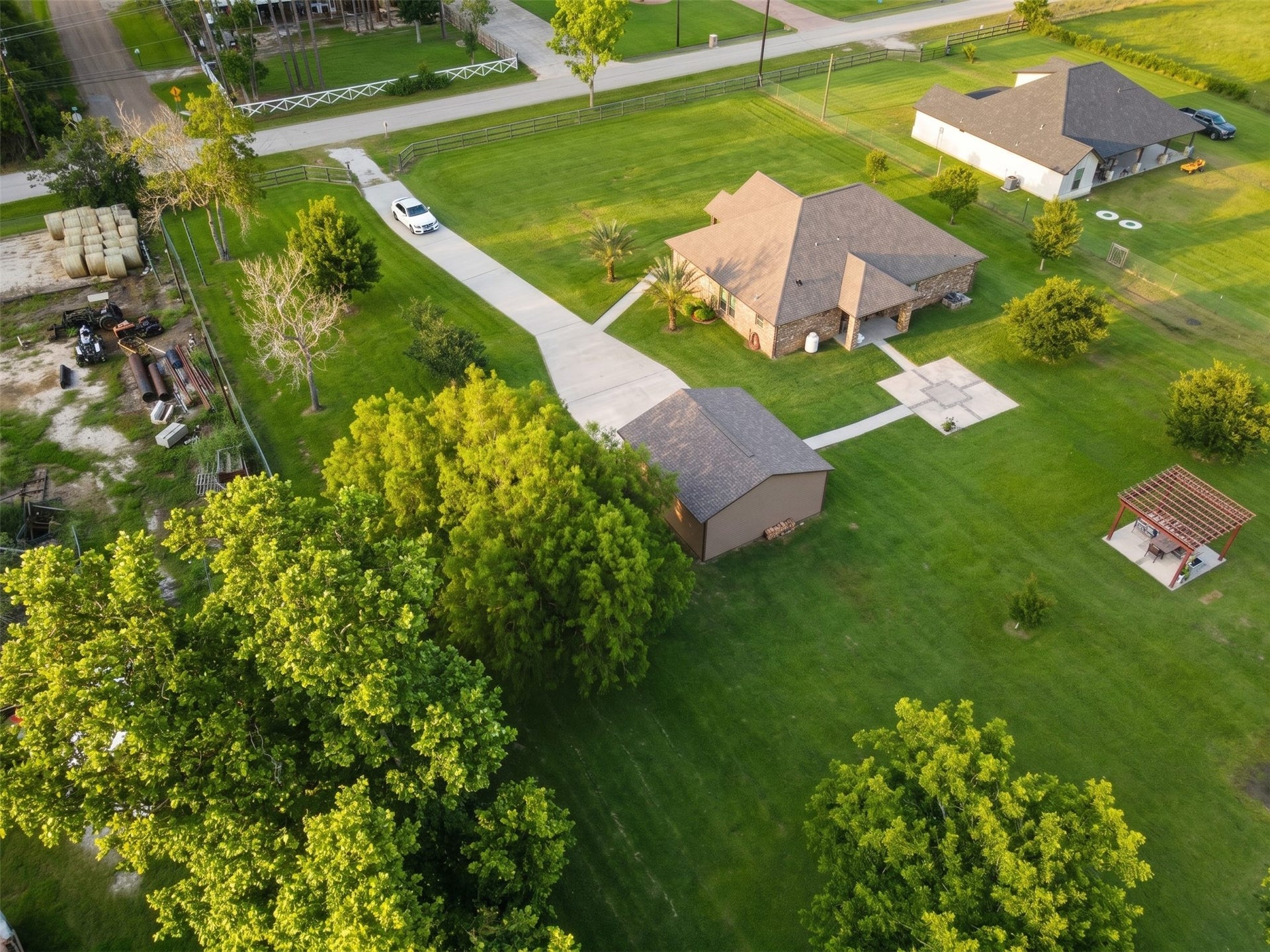 11021 32nd Street, Santa Fe, TX 77510 Sunset Aerial: The golden-hour aerial edit that leaves the buyer with a warm, expansive "welcome home" feeling