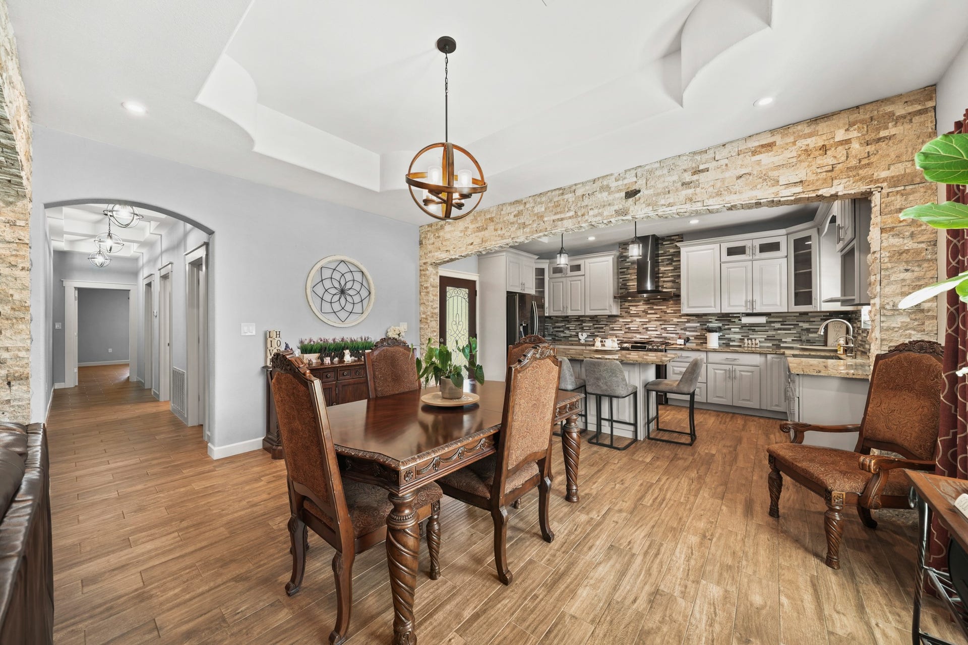 11021 32nd Street, Santa Fe, TX 77510 Formal Dining: Perfectly frames the dining table flowing into the kitchen workspaces