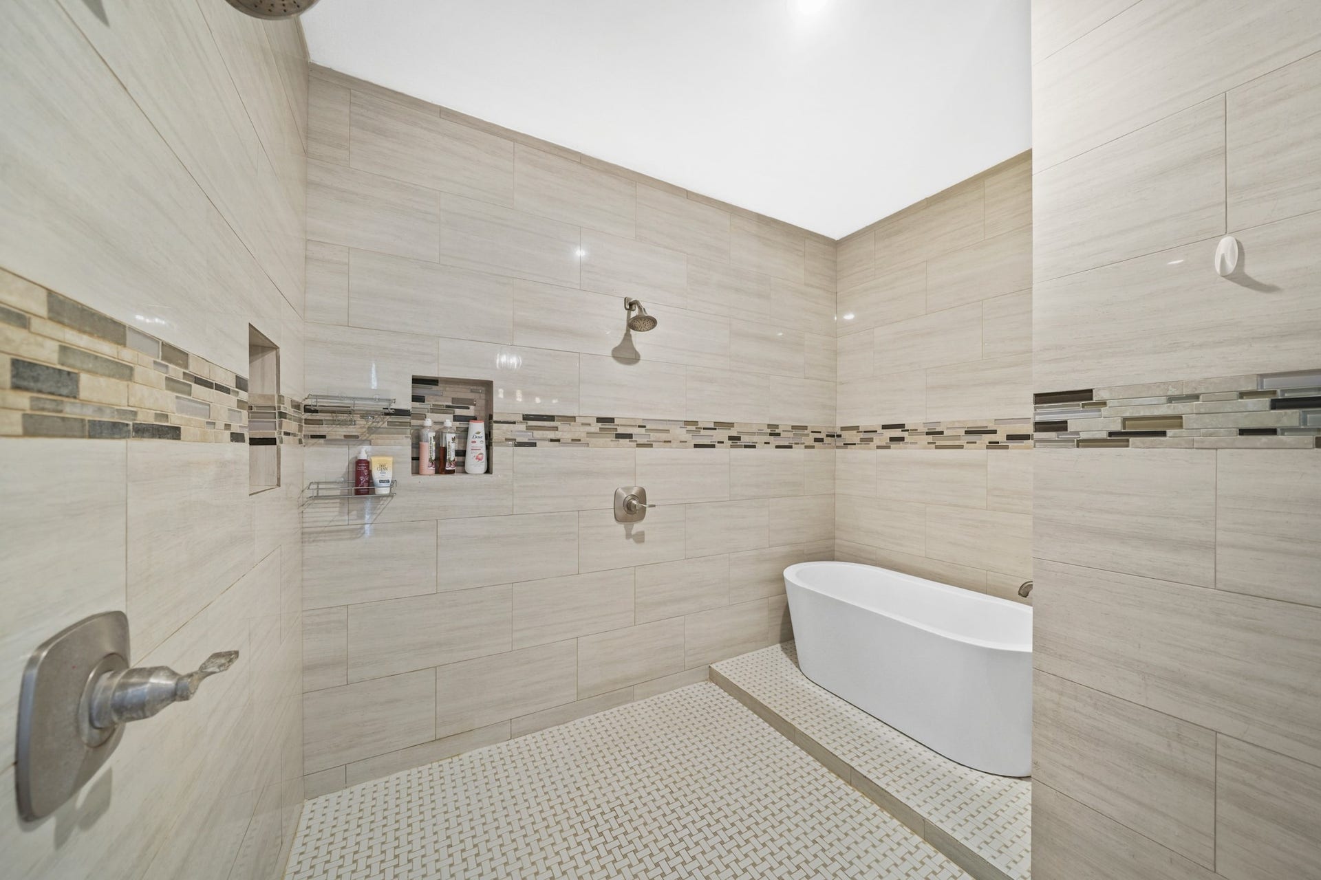 11021 32nd Street, Santa Fe, TX 77510 Shower/Tub Detail: A crucial shot highlighting the unique soaking tub situated inside the massive tile shower enclosure