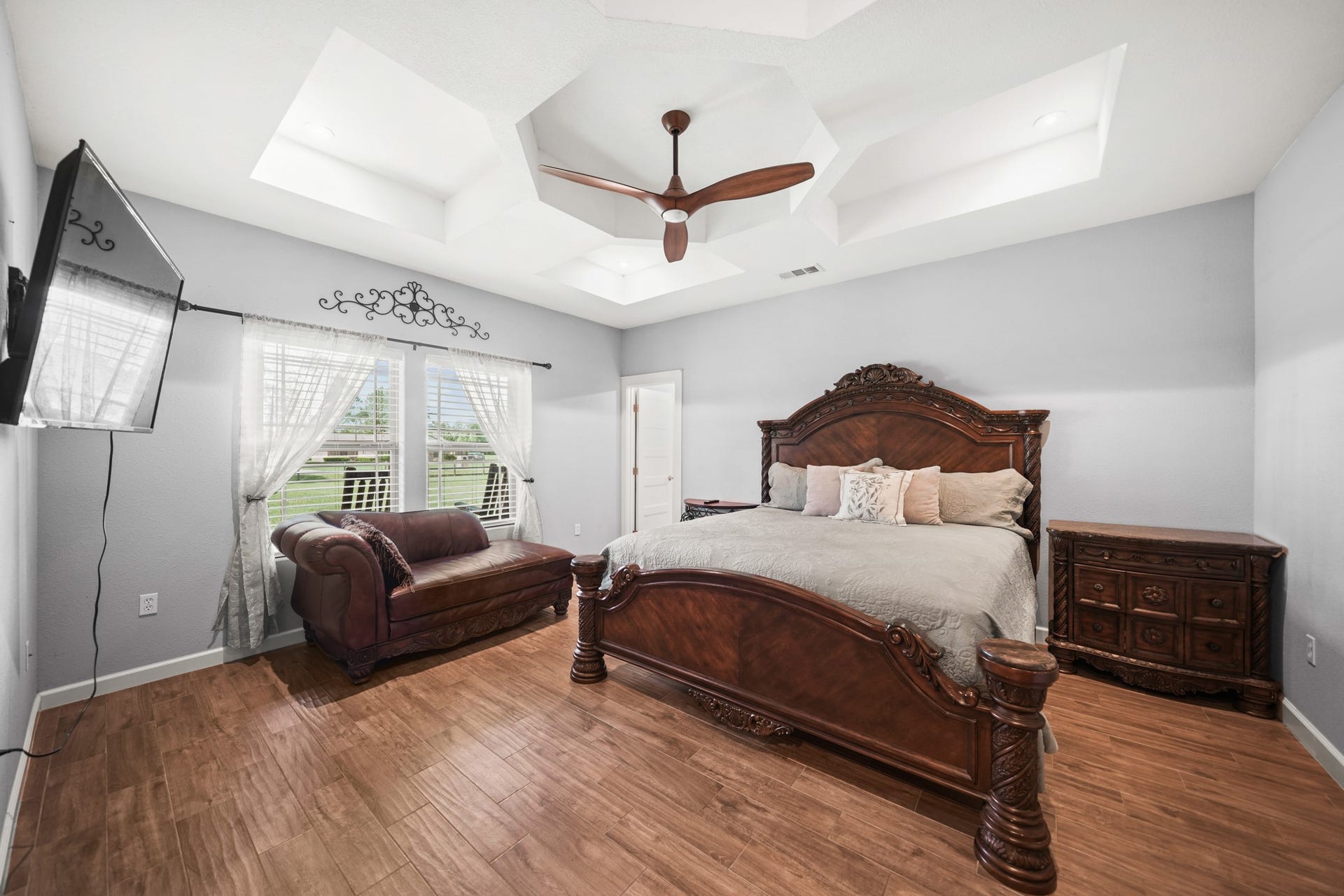 11021 32nd Street, Santa Fe, TX 77510 Primary Bedroom: The cleanest, most inviting shot of the primary bedroom showing the space and ceiling detail