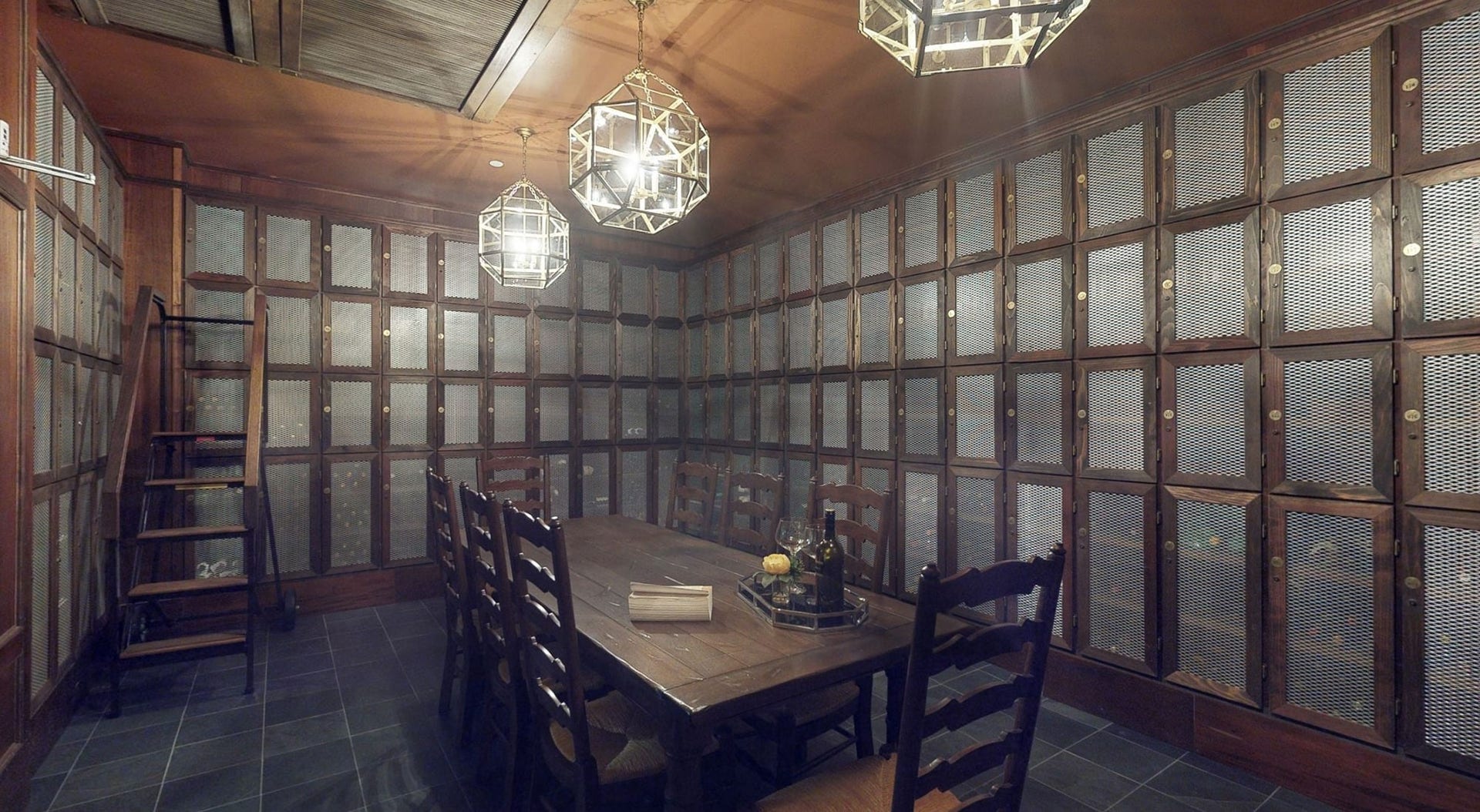 Climate controlled wine storage room with individual wine lockers included.