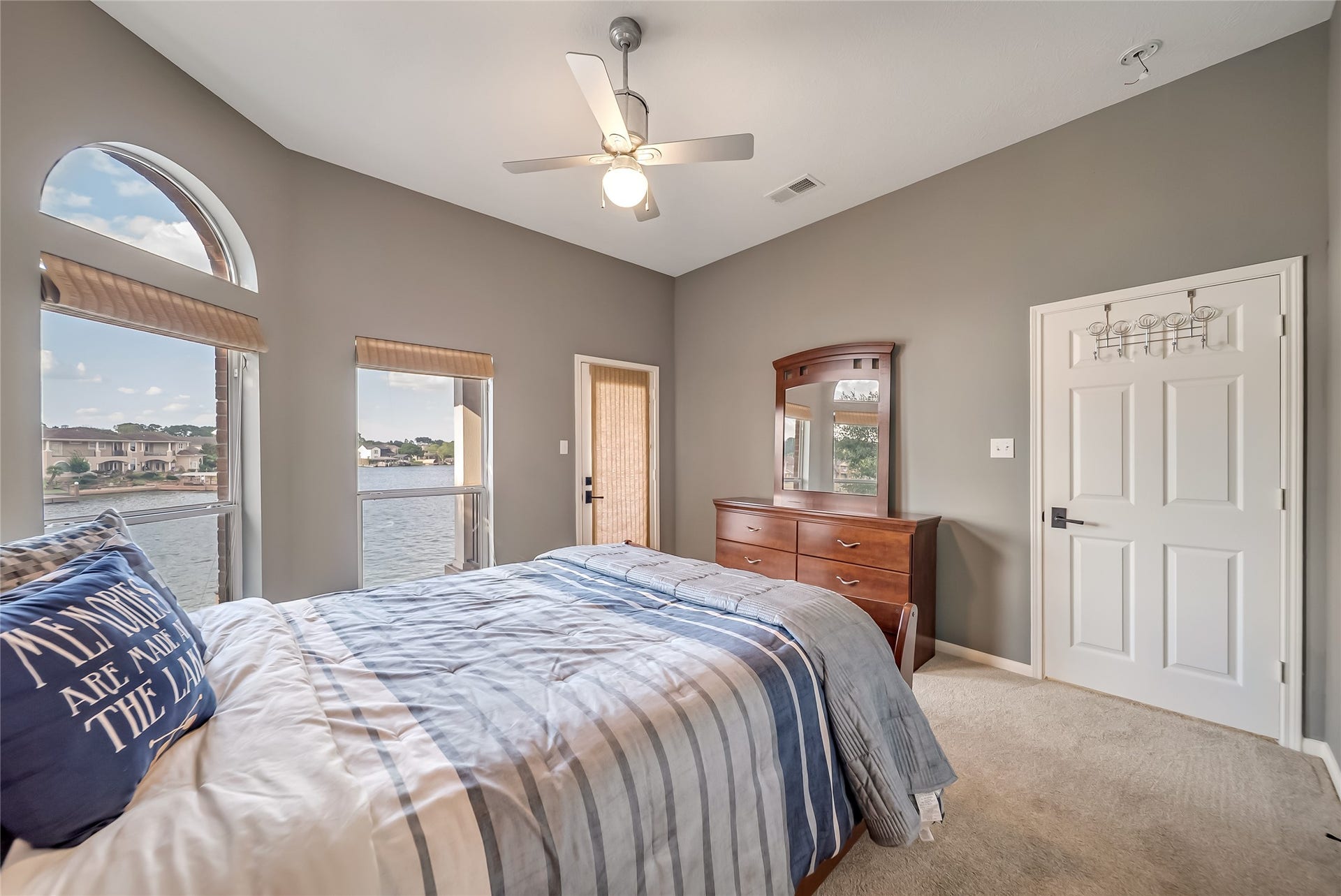 318 Bayshore Drive, Montgomery, TX 77356 Bedroom 3 is perfectly positioned on the waterfront side of the home, offering beautiful lake views and an abundance of natural light throughout.