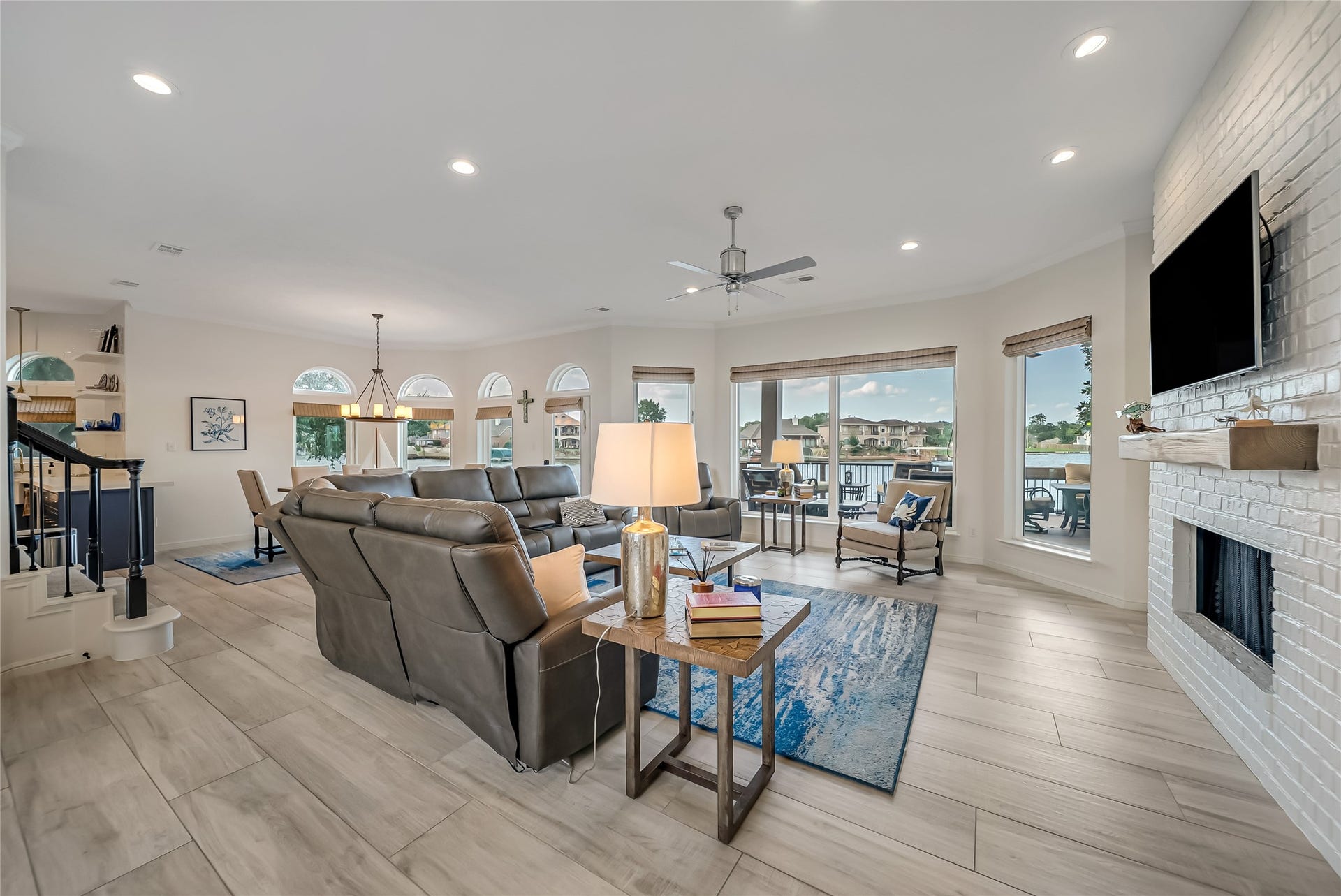 318 Bayshore Drive, Montgomery, TX 77356 The heart of the home is designed for both everyday living and entertaining, featuring an open-concept layout, beautifully renovated living spaces, and breathtaking lake views that create a seamless connection to the outdoor waterfront lifestyle.