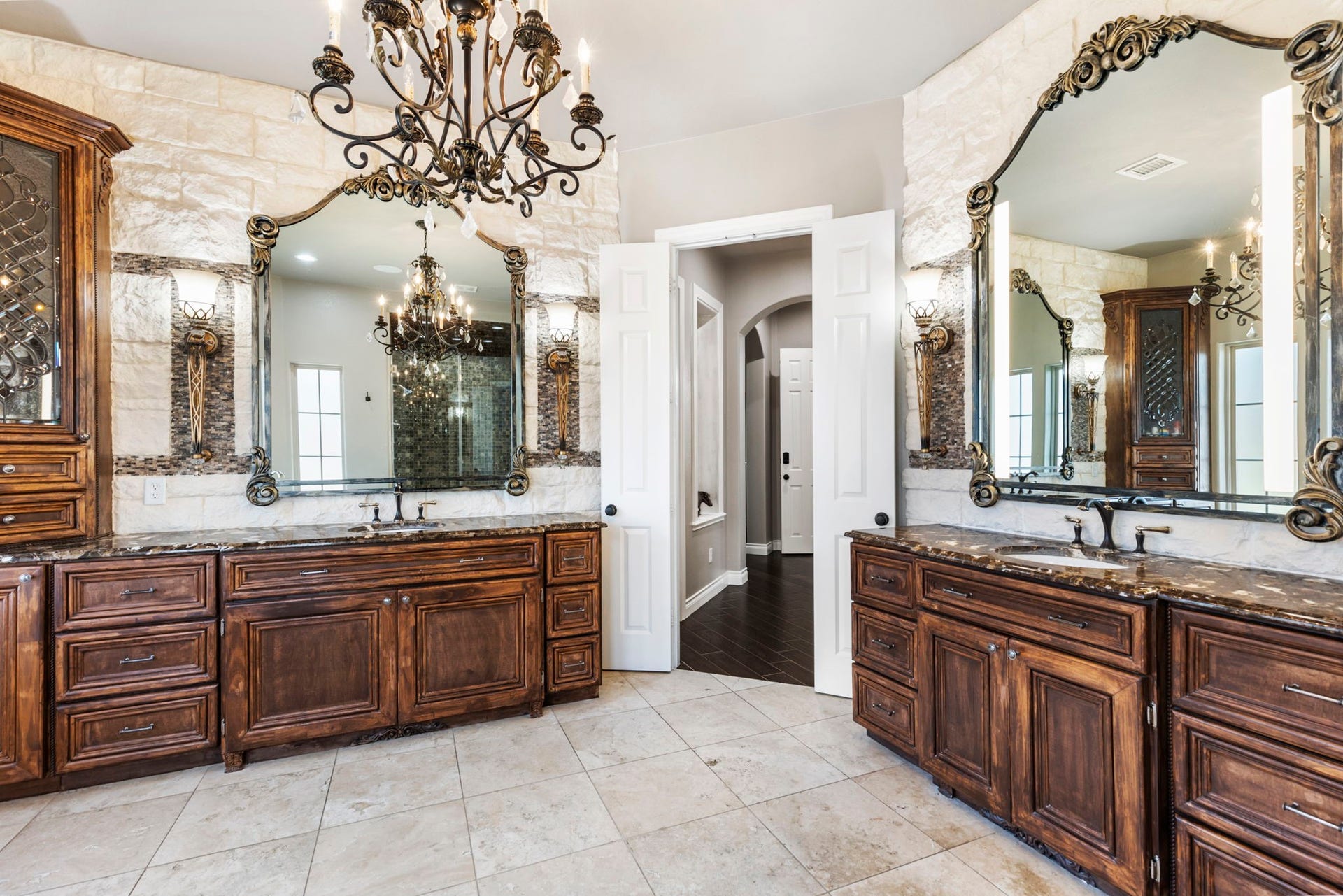 7930 Spring Village Drive, Spring, TX 77389 Luxurious primary bath has double vanities and counter space.