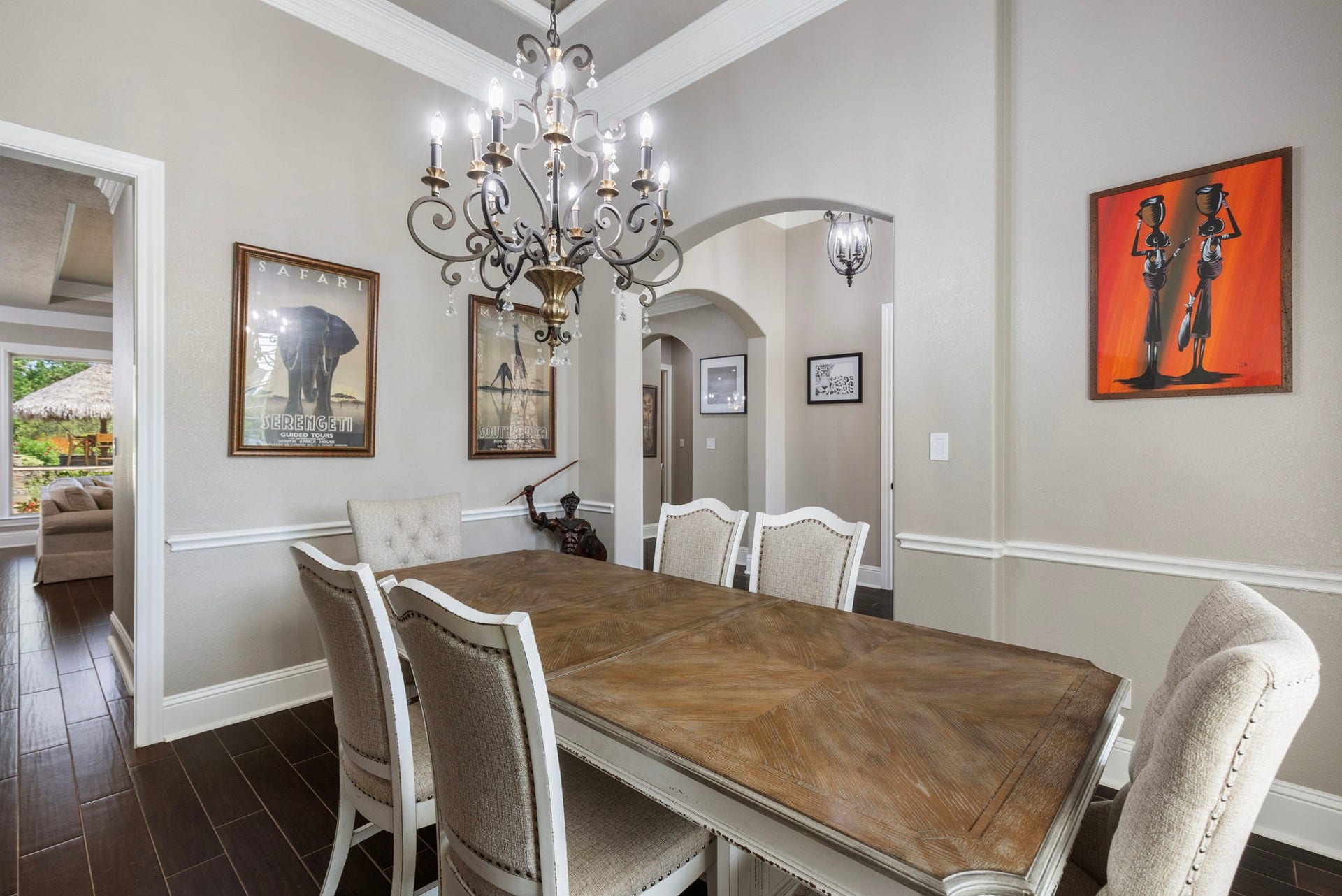 7930 Spring Village Drive, Spring, TX 77389 Beautiful formal dining room has crown molding, tray ceiling and chair rail.