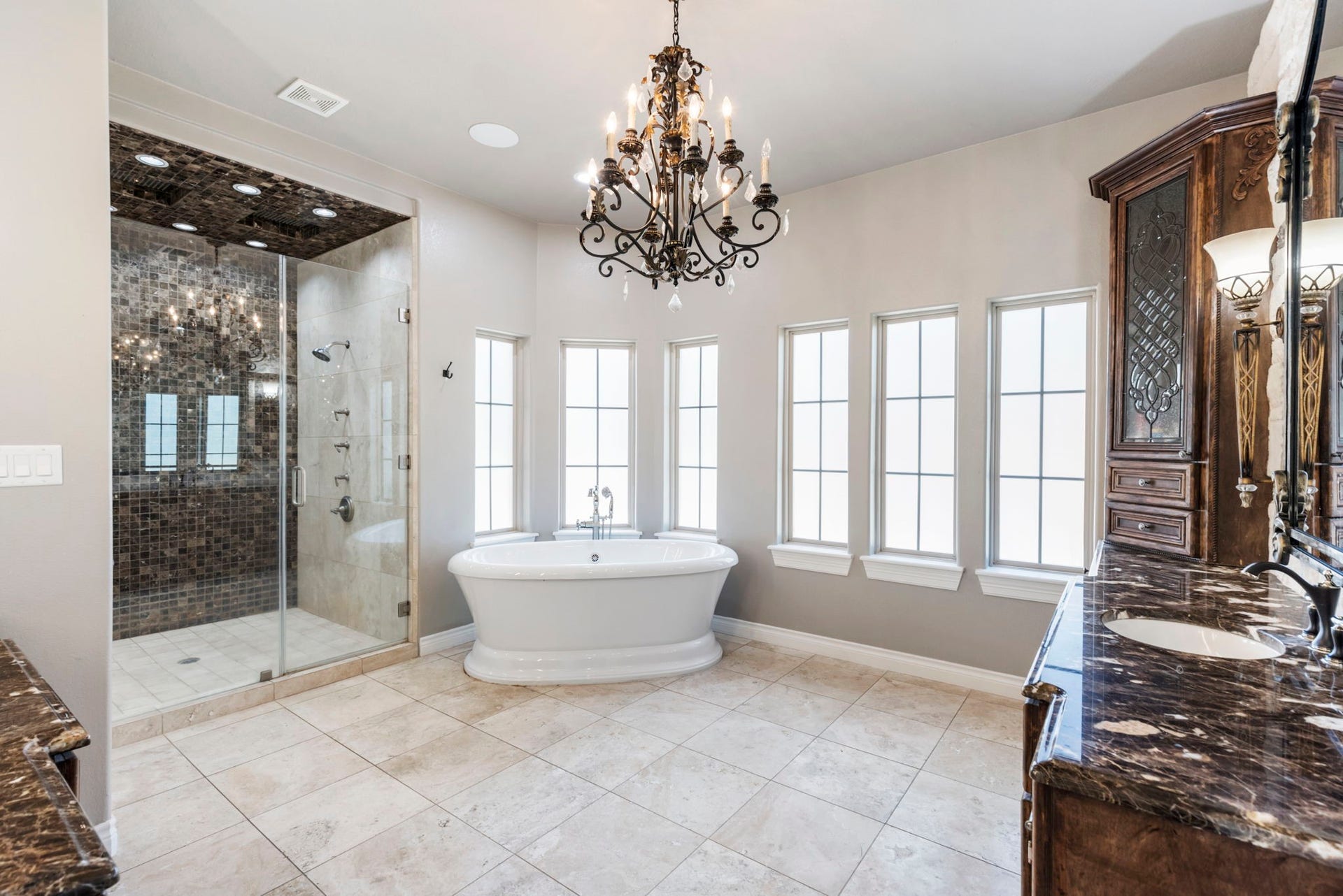 7930 Spring Village Drive, Spring, TX 77389 Separate shower and soaking tub and plenty of cabinets for storage.