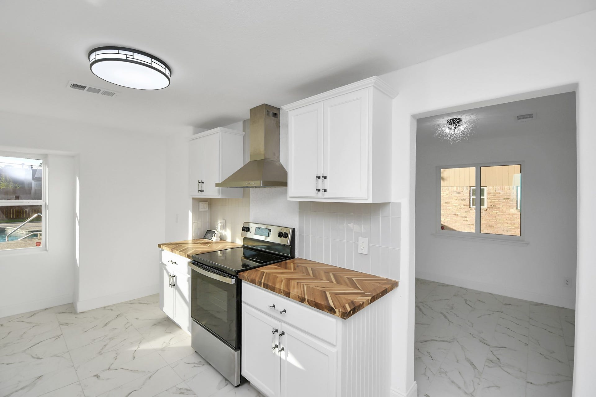 6035 Cartagena Street, Houston, TX 77035 The dining room is conveniently located next to the kitchen, making entertaining effortless