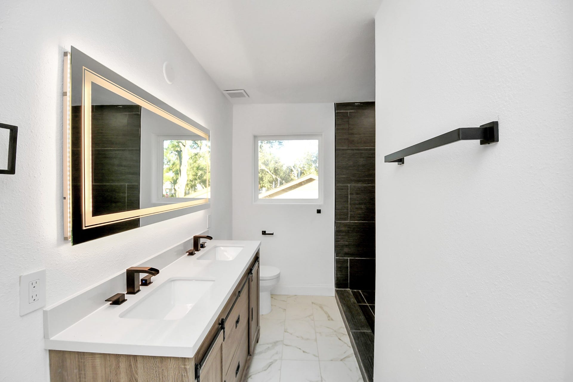 6035 Cartagena Street, Houston, TX 77035 Around the corner you will find a sleek walk-in shower.