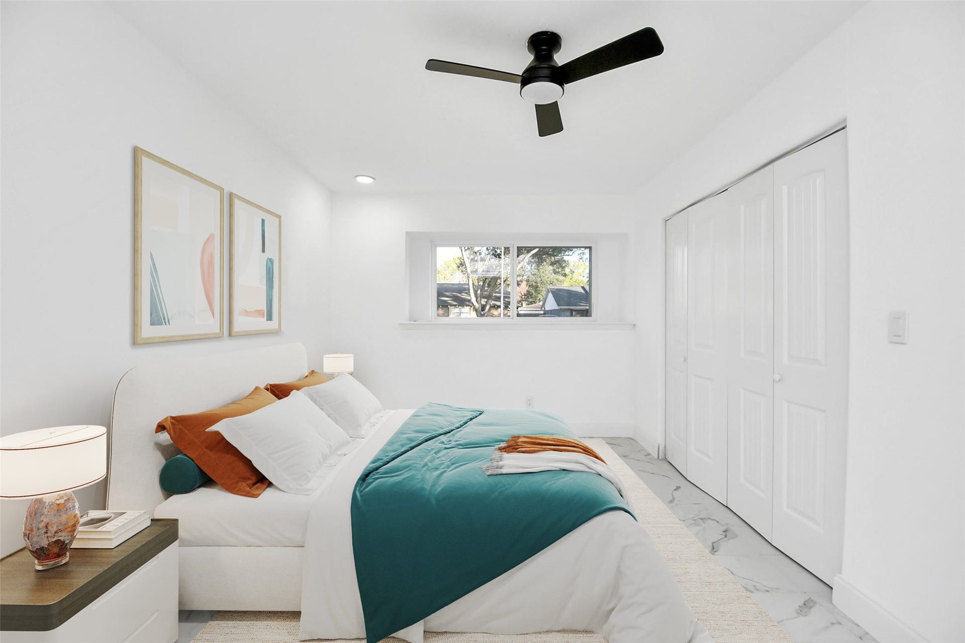 6035 Cartagena Street, Houston, TX 77035 This owner's suite is generously sized, featuring the same marble subway tiles and crisp white walls, providing the perfect canvas for your design ideas. (Virtually Staged)