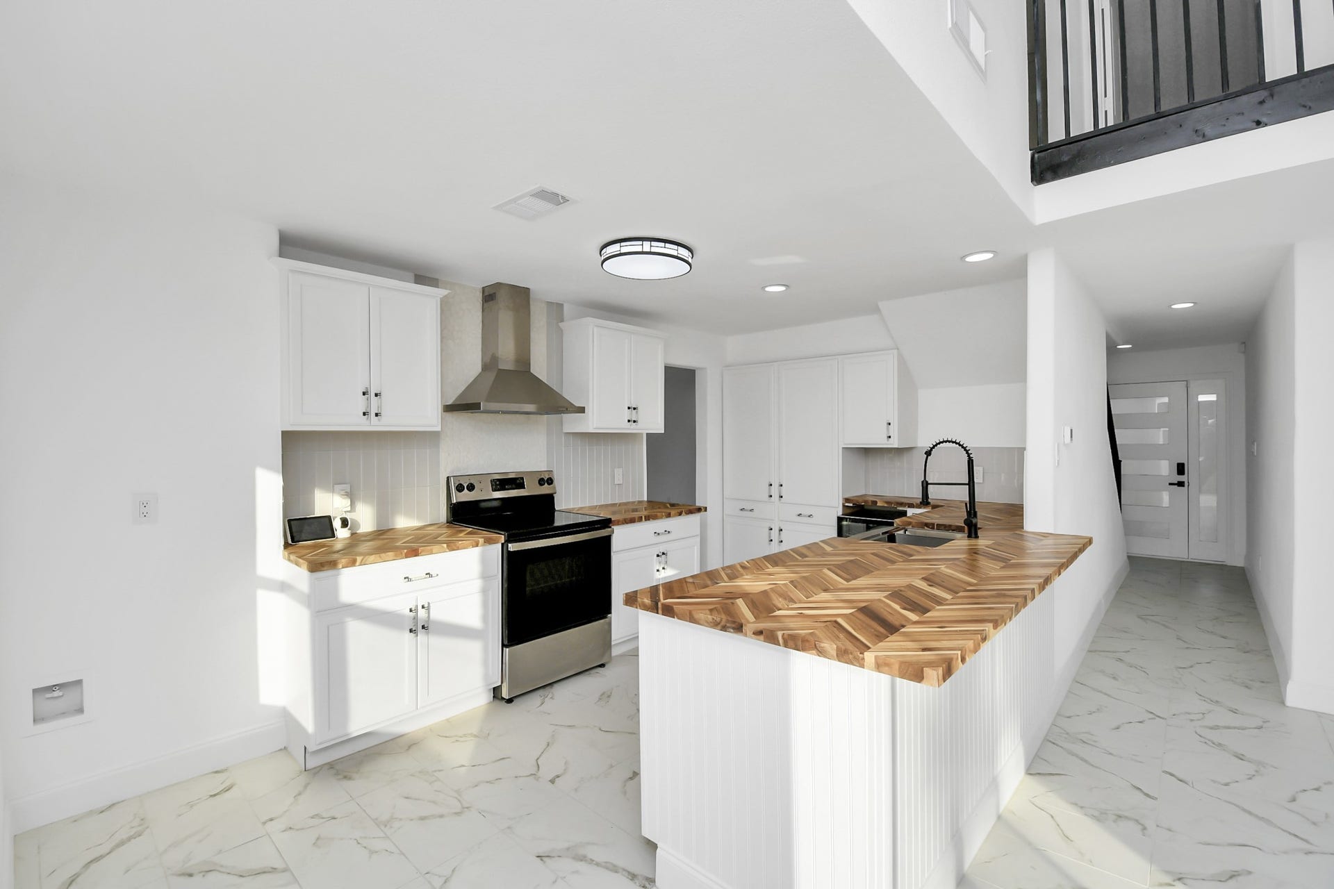 6035 Cartagena Street, Houston, TX 77035 The kitchen truly serves as the heart of the home, offering a welcoming space where everyone can come together to create lasting memories.
