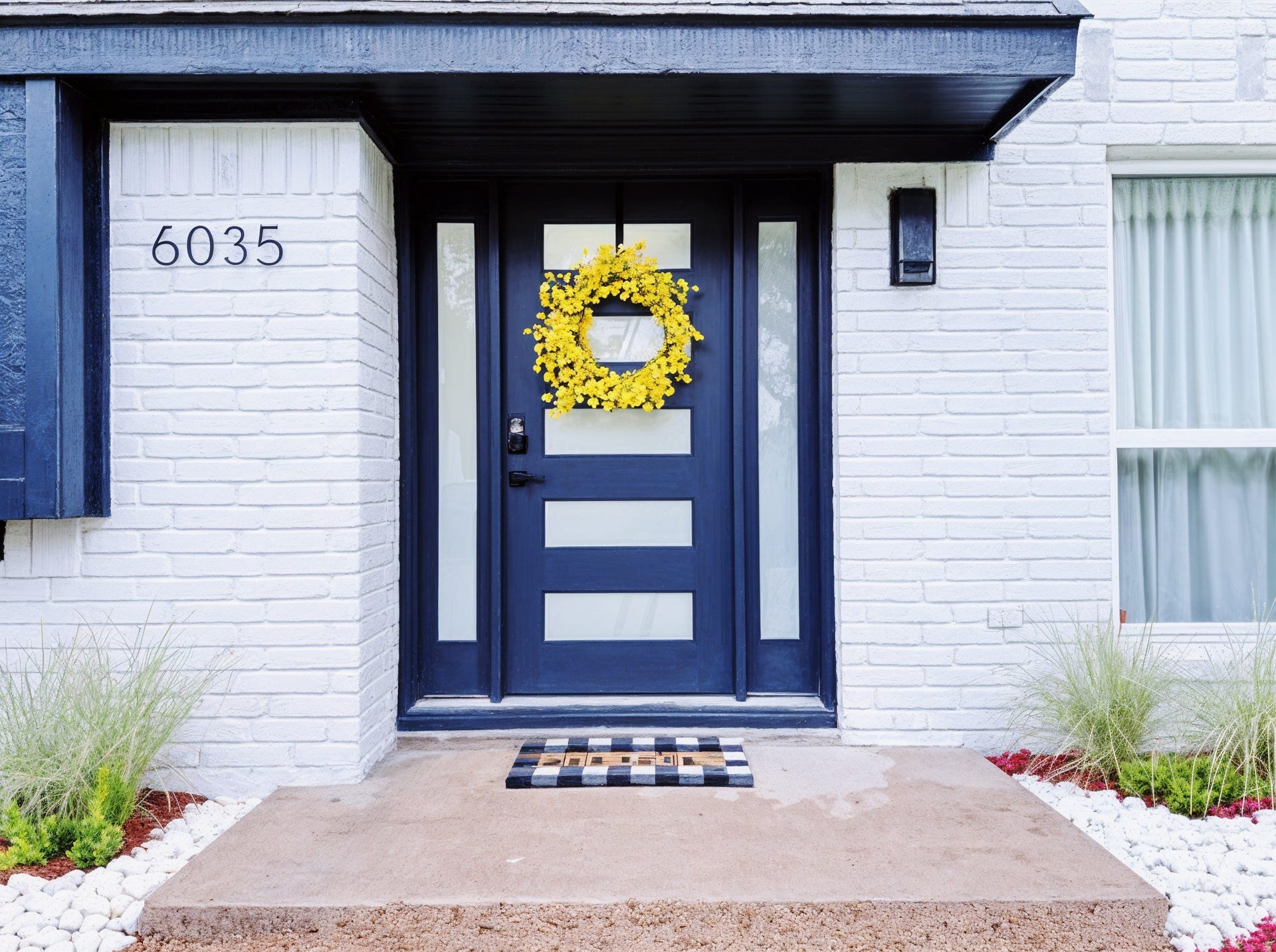 6035 Cartagena Street, Houston, TX 77035 A vibrant color option for the front door adds to curb appeal and welcomes you inside this gorgeous modern home.