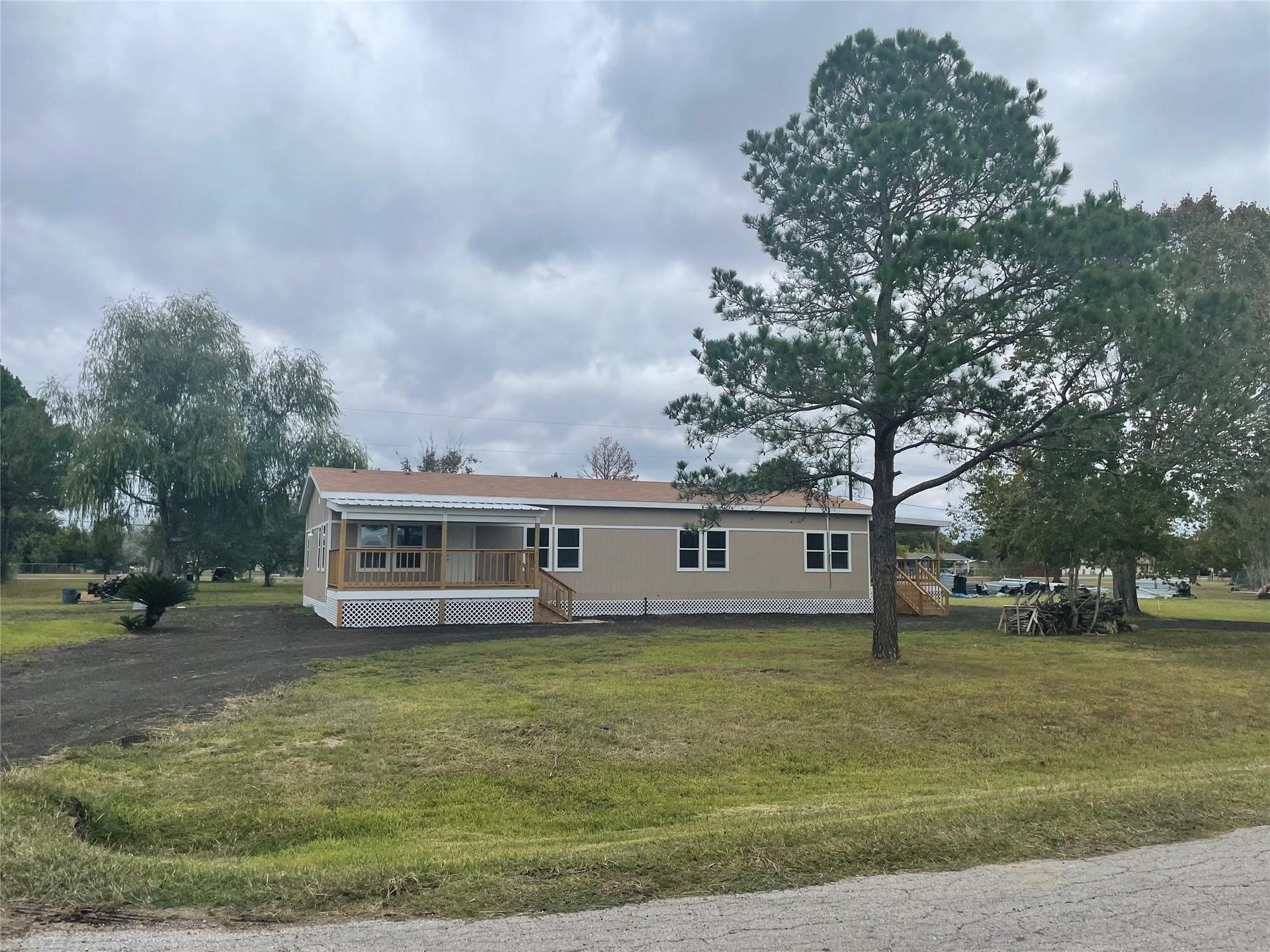 2210 Arapahoe Drive, Rosenberg, TX 77471 Front of the modular home in a 1 acre lot.