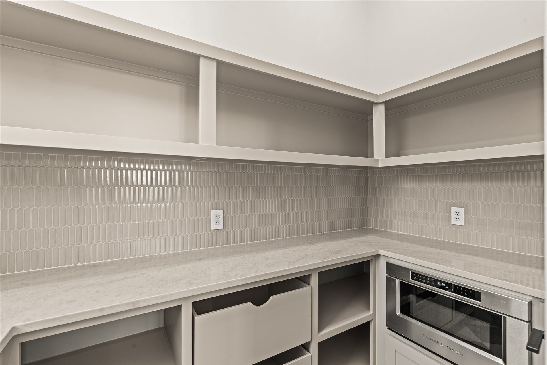 2011 Singleton Street, Houston, TX 77008 Walk-in butler pantry with sink and a large countertop area. Keep your kitchen uncluttered - park your air fryer, Kitchenaide mixer, espresso machine, and all the other kitchen gadgets your heart desires in here.