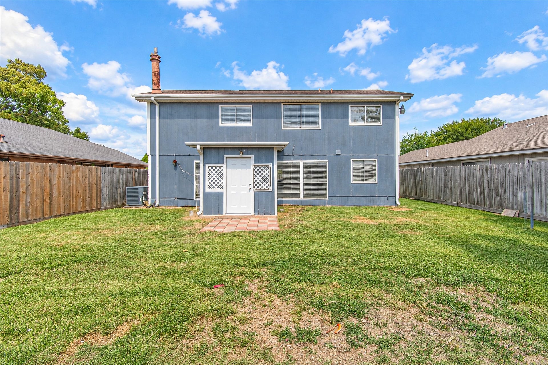 12027 Huntington Park Drive, Houston, TX 77099 Charming two-story home with a spacious, fenced backyard, perfect for outdoor activities and gatherings.