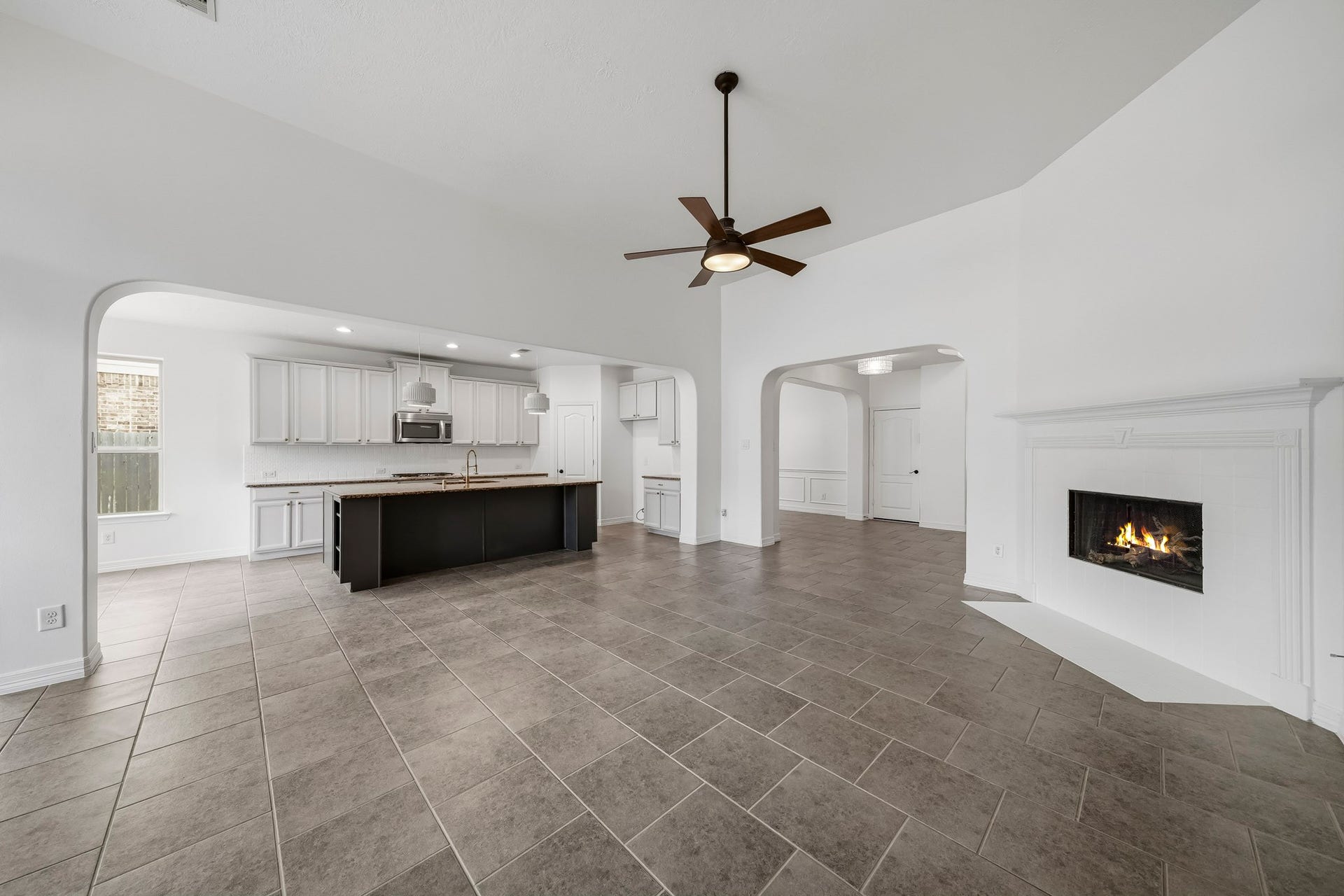28906 Davenport Drive, Katy, TX 77494 another view of the living room showing the fireplace