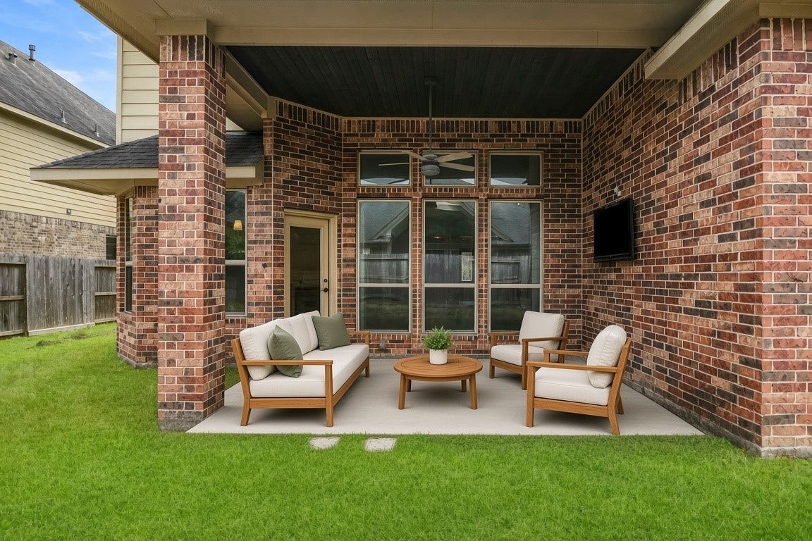 28906 Davenport Drive, Katy, TX 77494 virtually staged - Covered patio w/ TV and ceiling fan