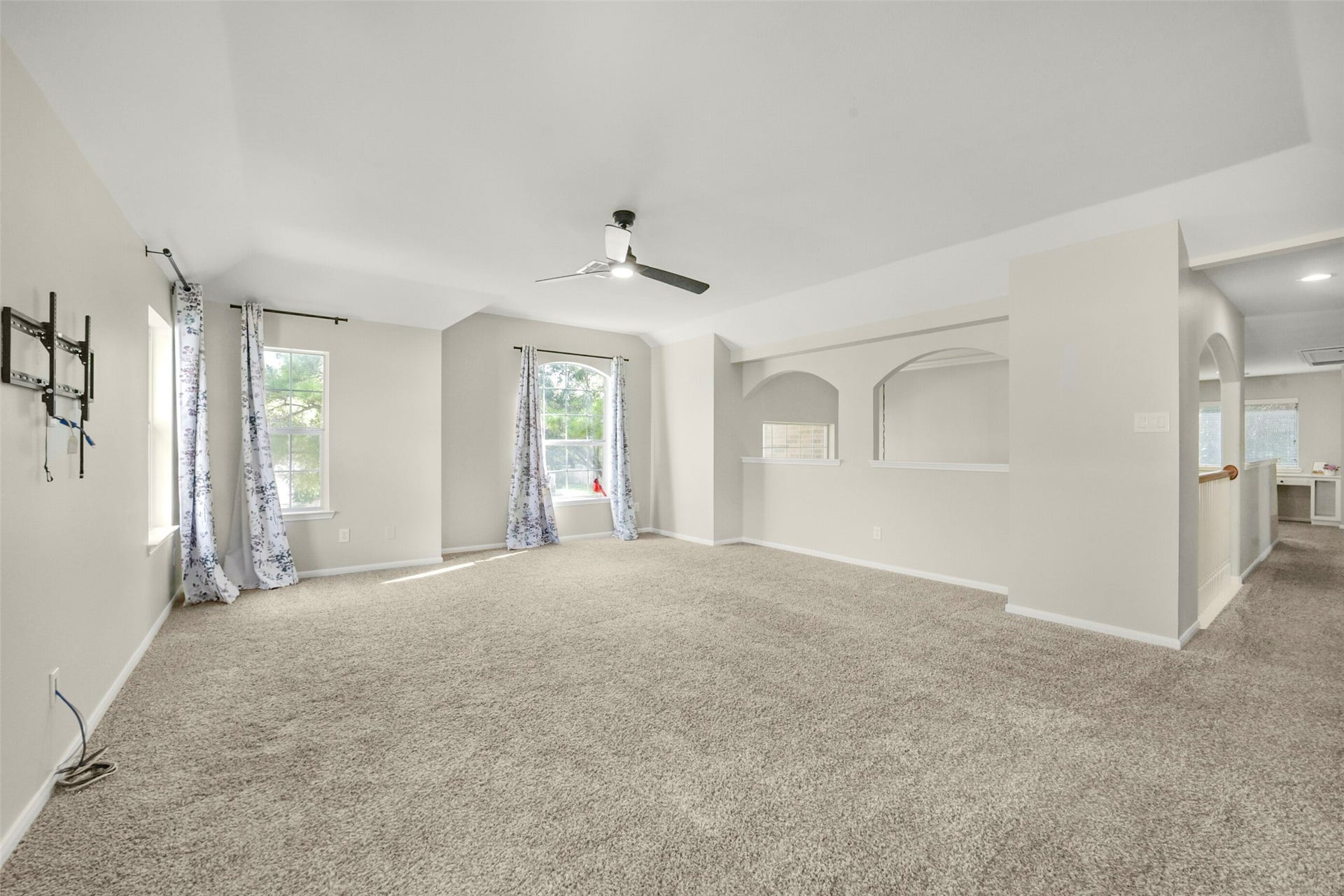 15730 Lake Loop Drive, Cypress, TX 77433 Versatile game room perfect for pool, card games, or relaxing with a comfy couch and large screen TVmake it your own entertainment haven!