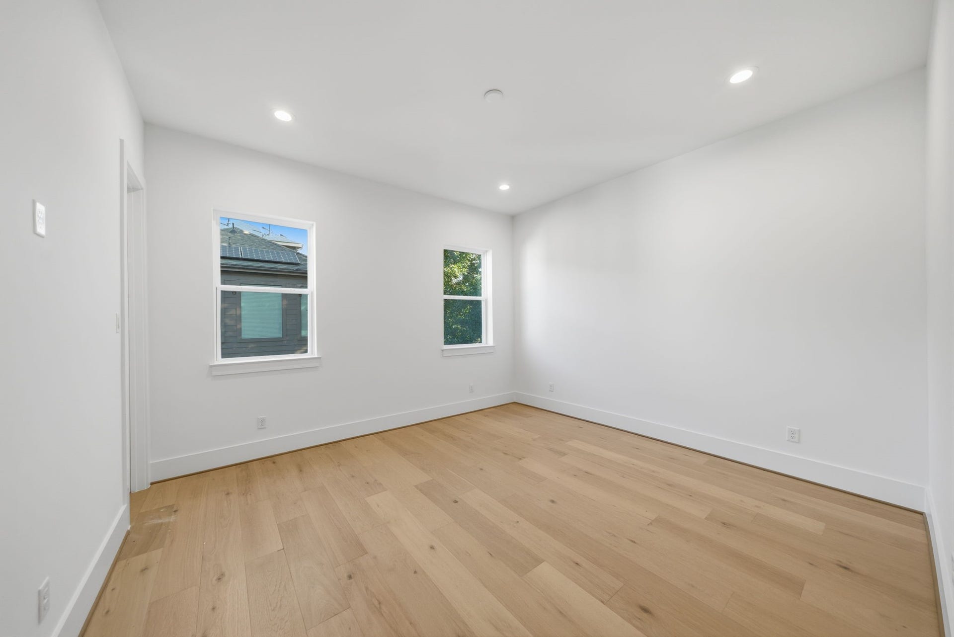 Photo of one of the sizable guest bedrooms with large closet and adjoining bath. (Photos are of a previously completed home. Finishes are subject to change.)