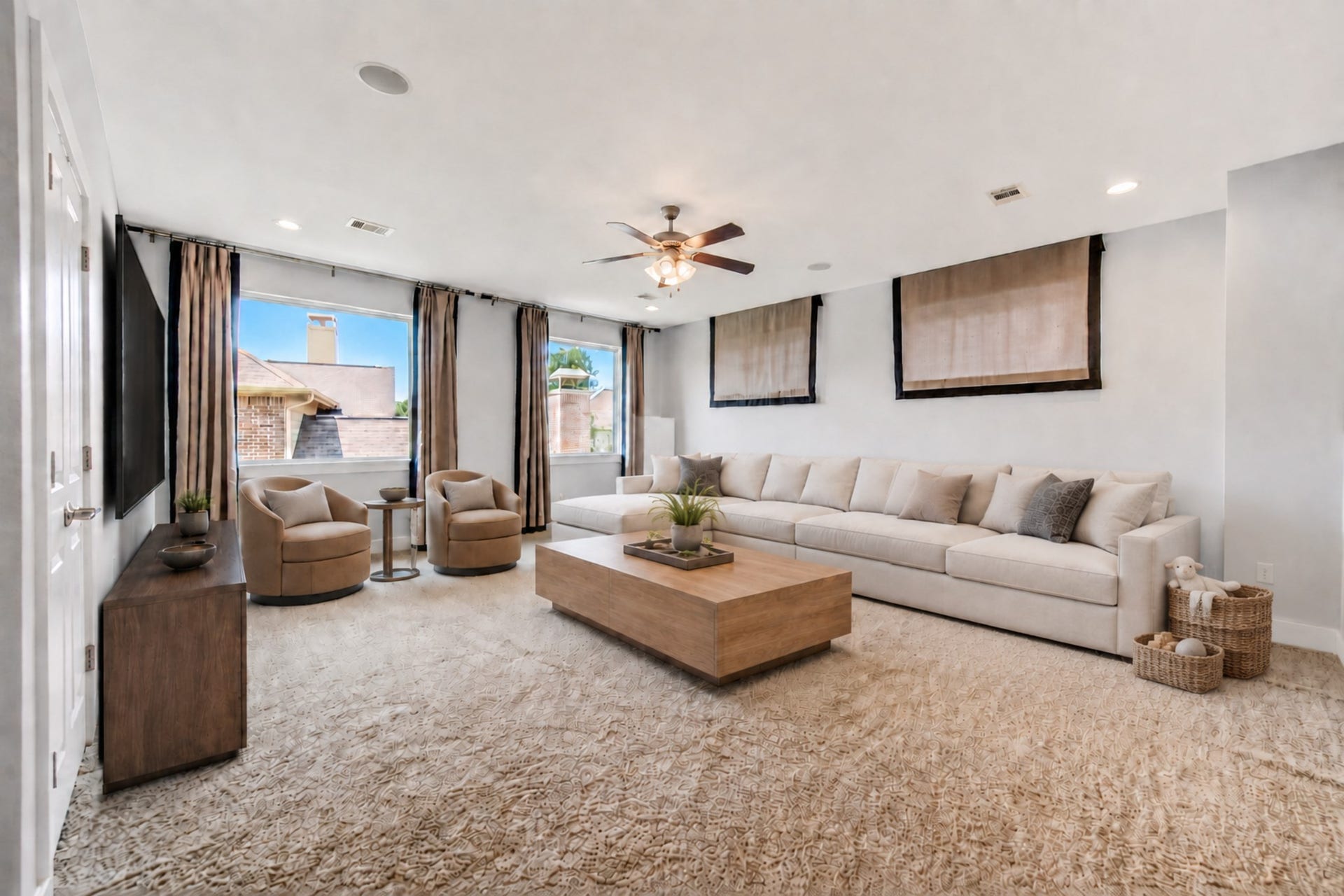 At the top pf the stairs, an expansive game. room offers a versatile second living area for movies, playtime, relaxation or entertaining. Digitally staged.
