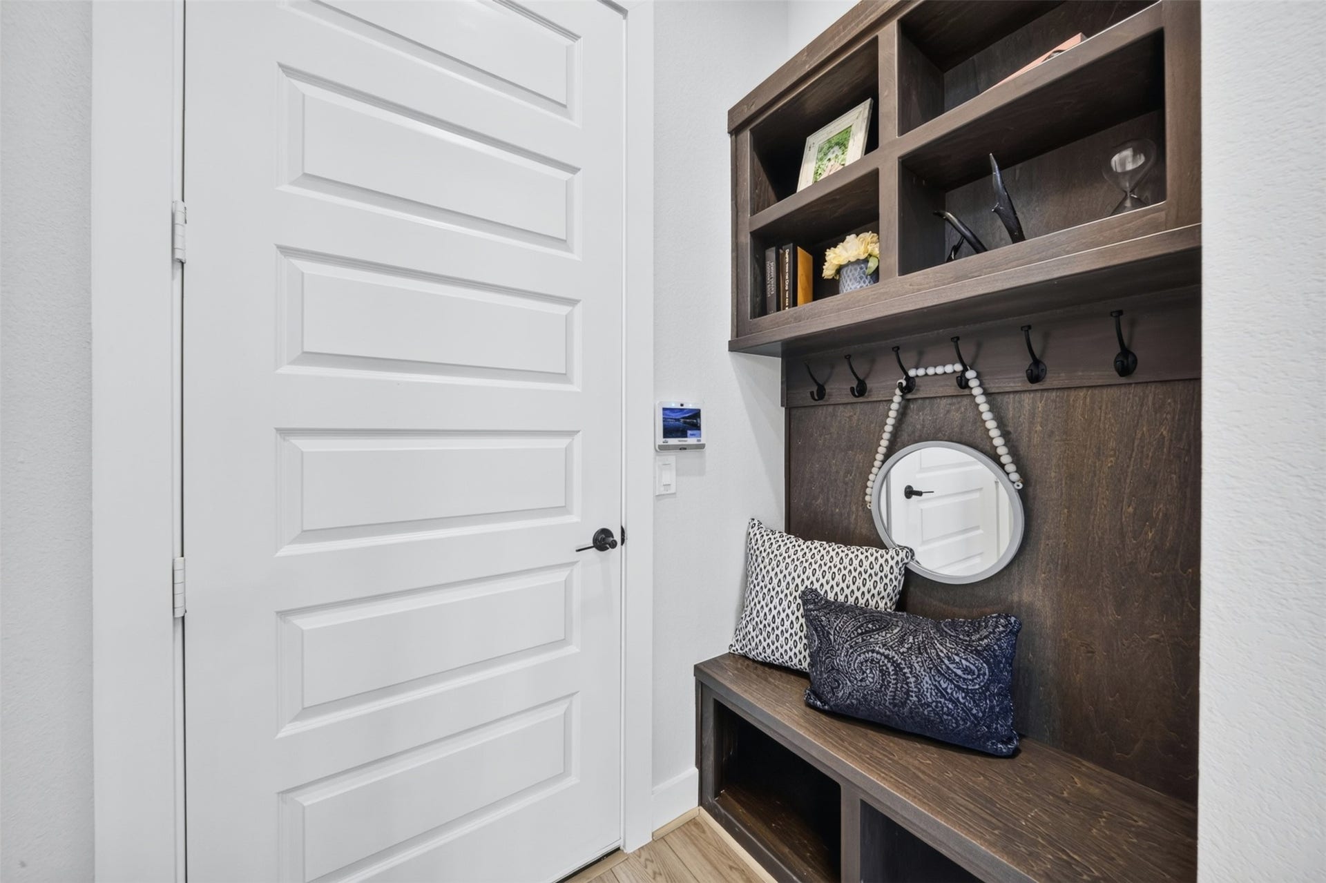 32510 Ebony Jewelwing Court, Fulshear, TX 77441 Built-In Drop Zone Thoughtfully designed mudroom area featuring built-in bench seating, storage cubbies, hooks, and shelving for everyday organization.