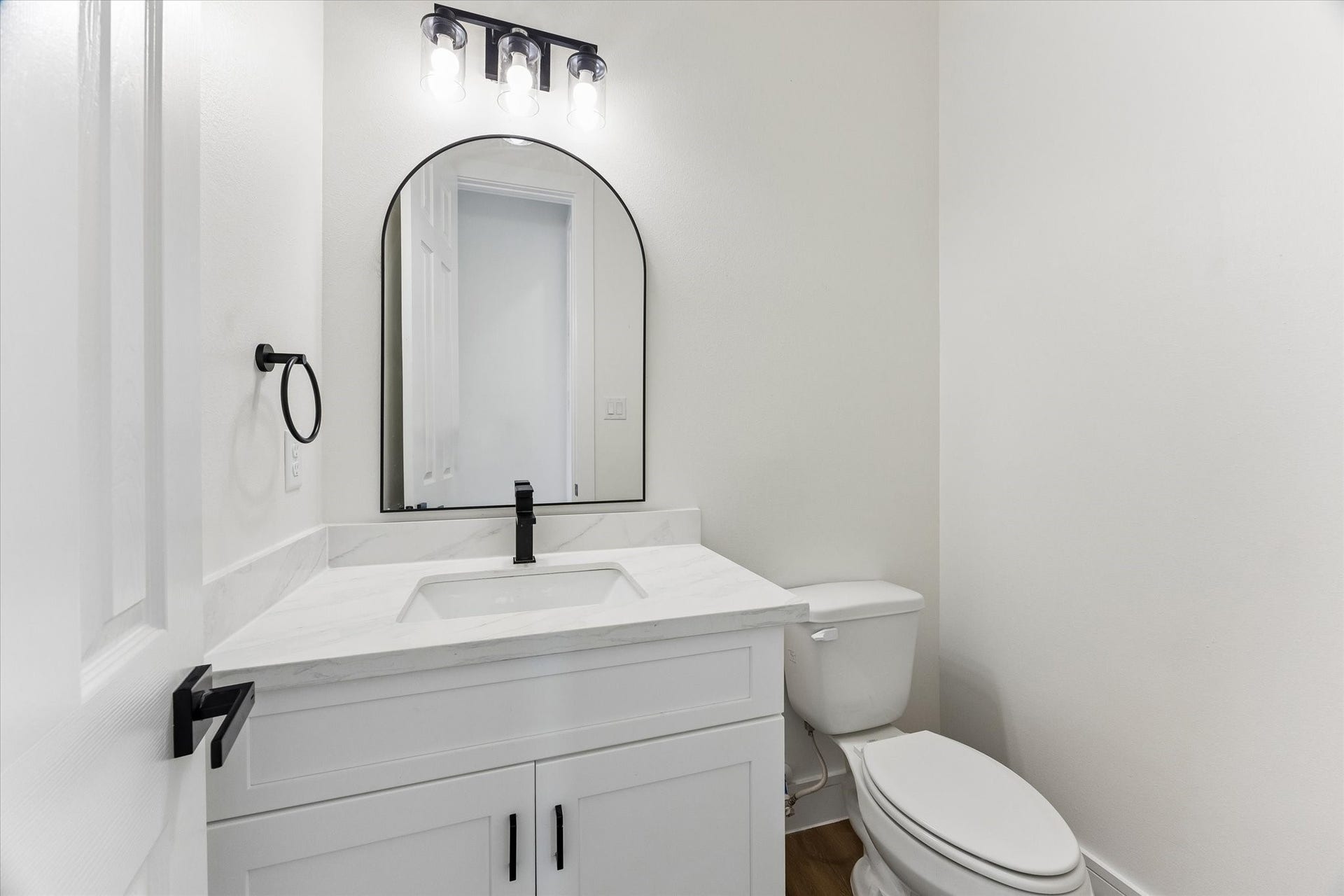 5106 Ricky Street, #A, Houston, TX 77033 1/2 Bathroom for guests on the first floor near kitchen.